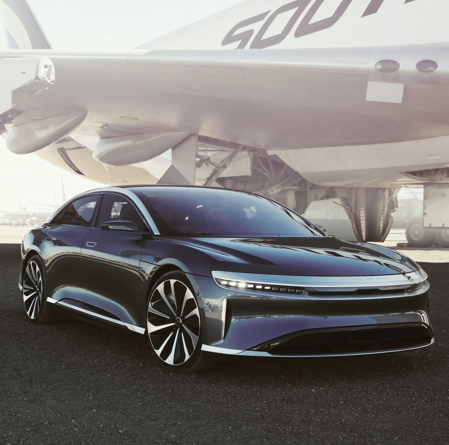 lucid motors air ev with plane