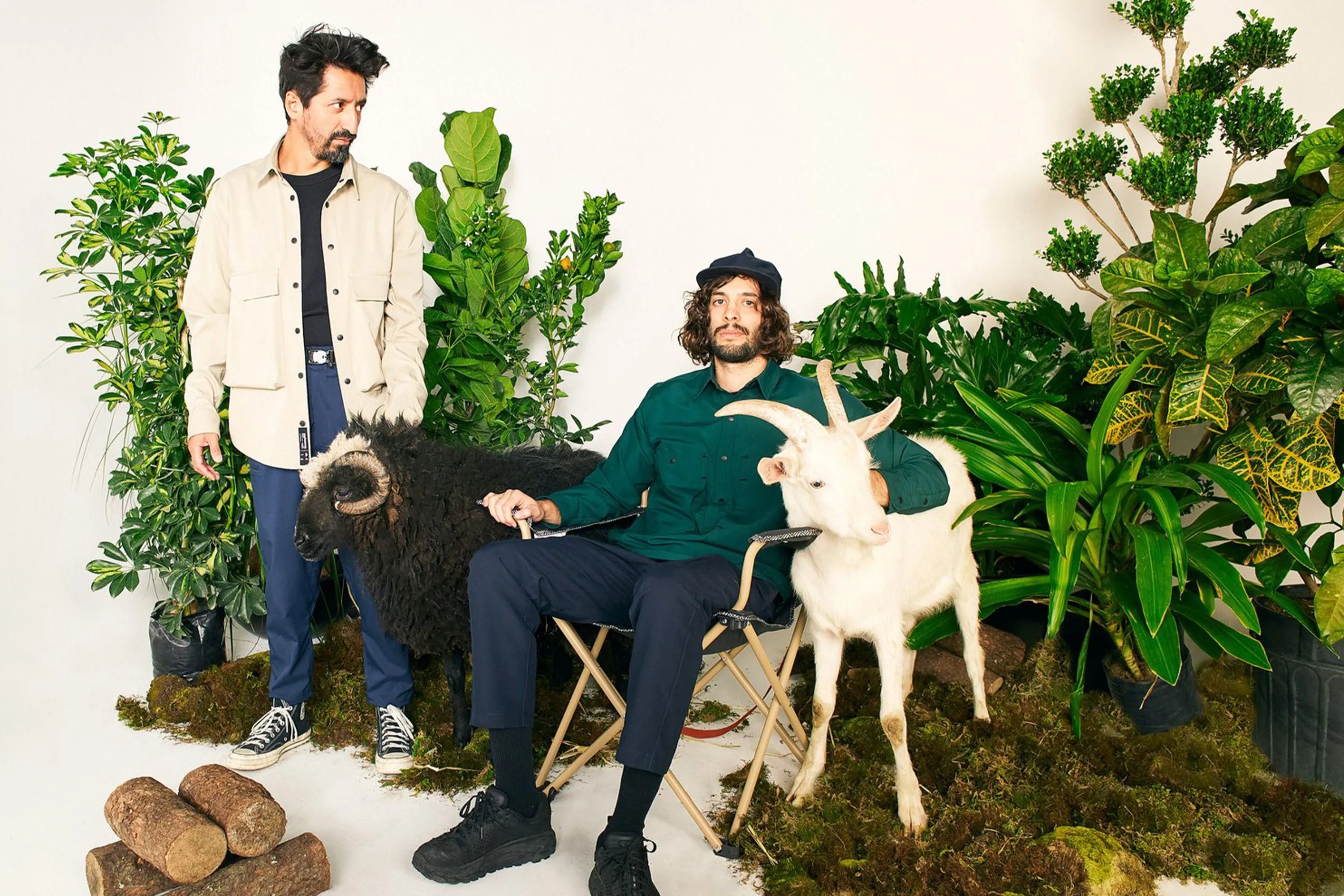 two men and two goats