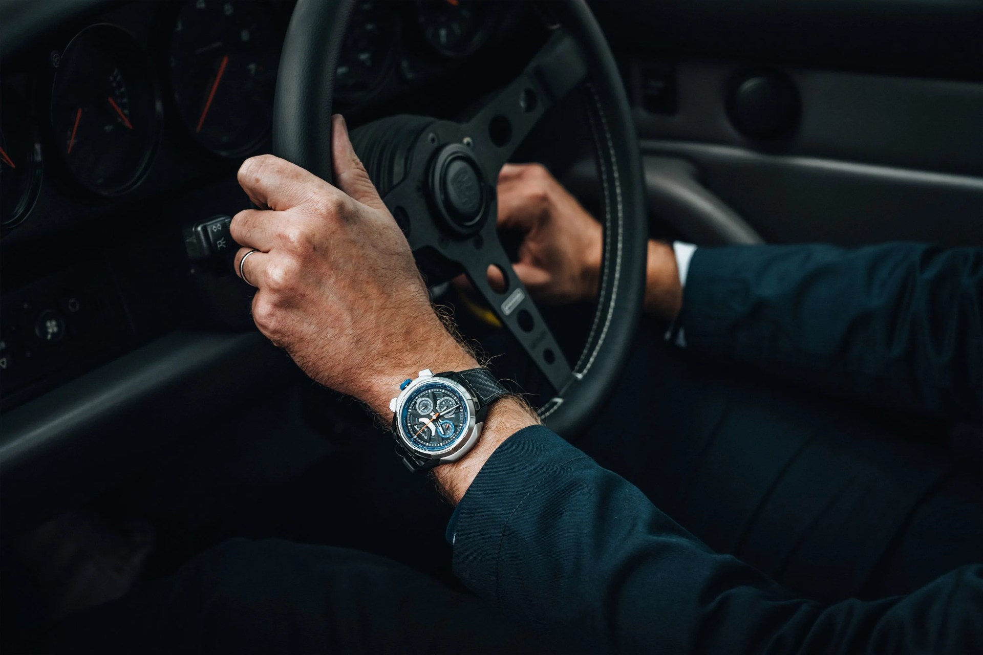 man wearing rec watch driving