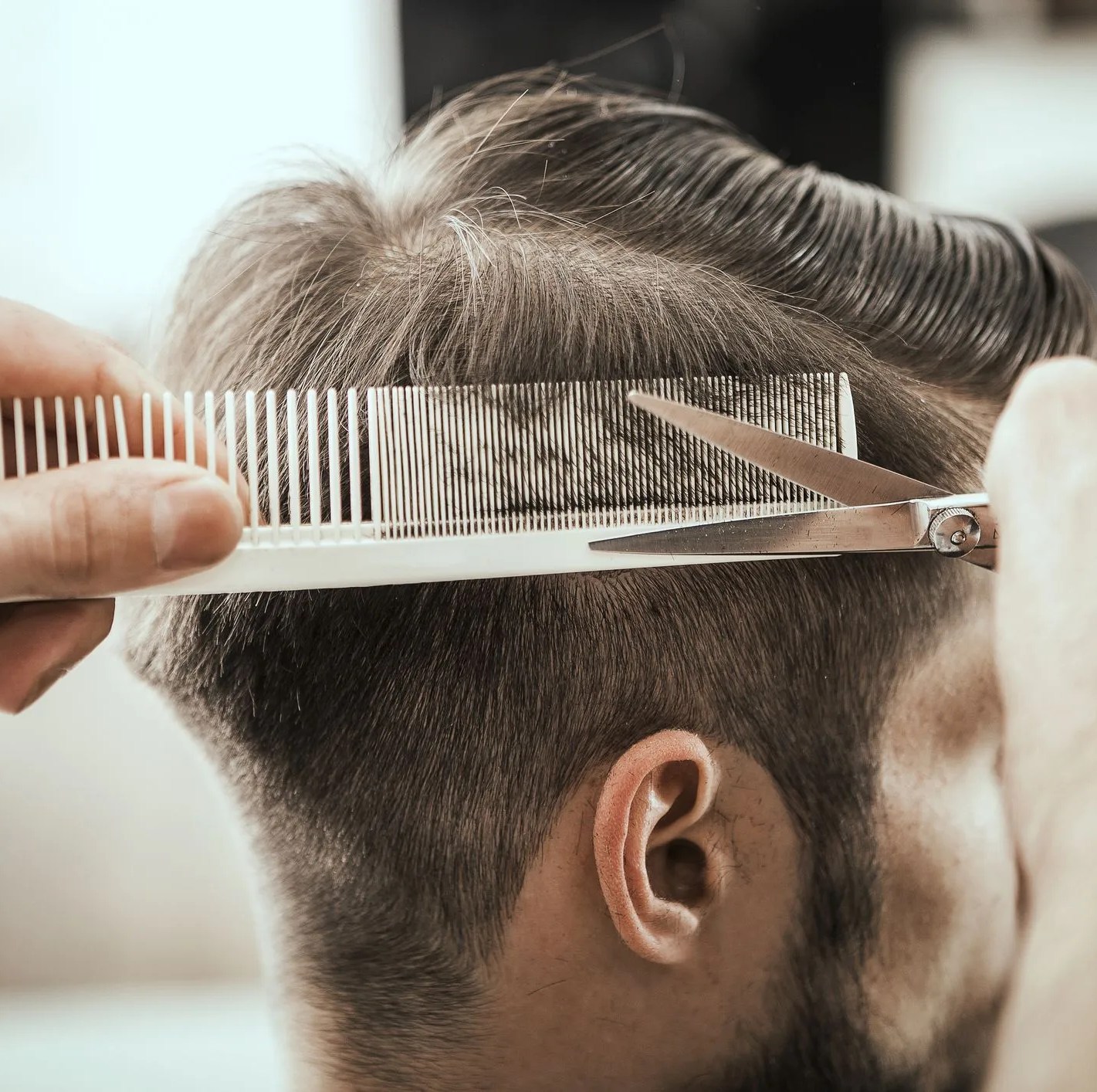 styling hair by professional hairdresser