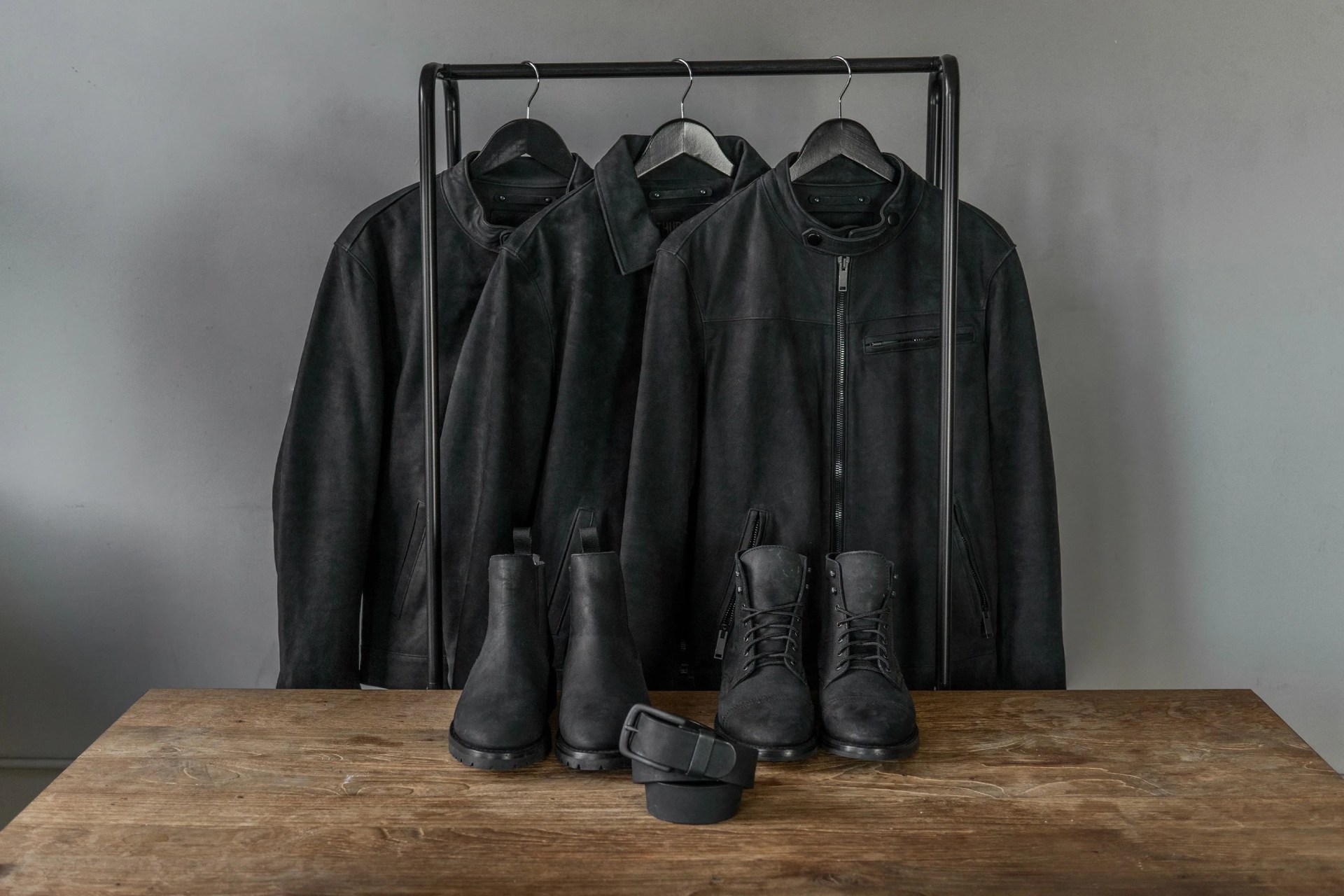 thursday boot clothing hung on rack