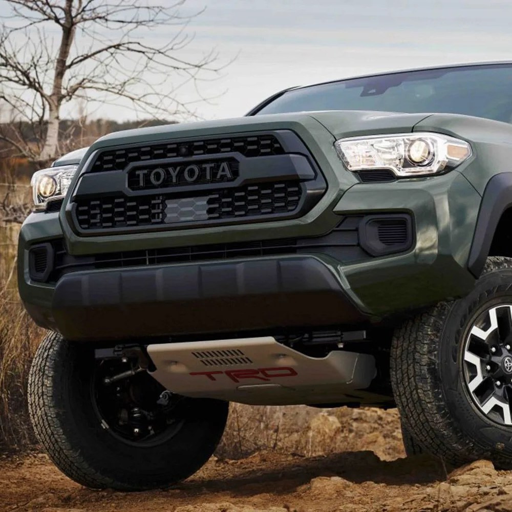 toyota tacoma coming over a crest