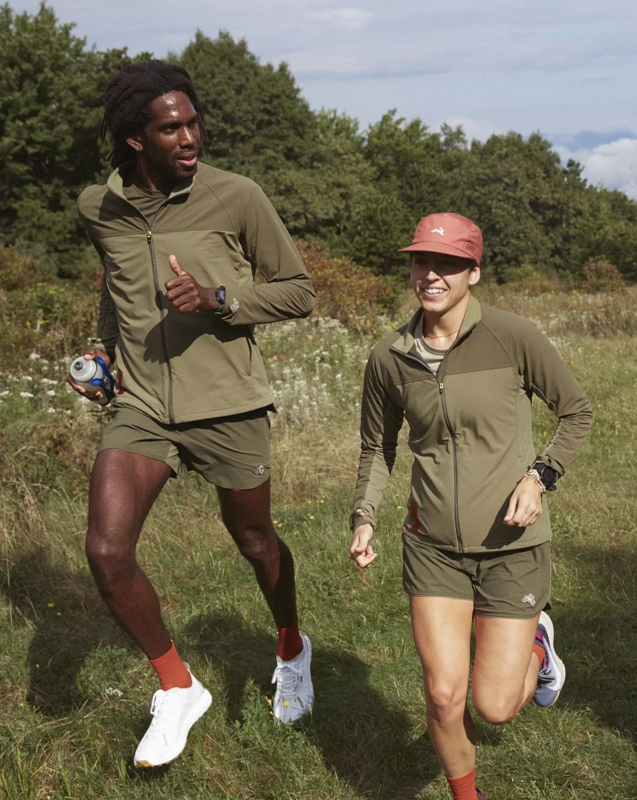 man and woman running wearing new tracksmith collection