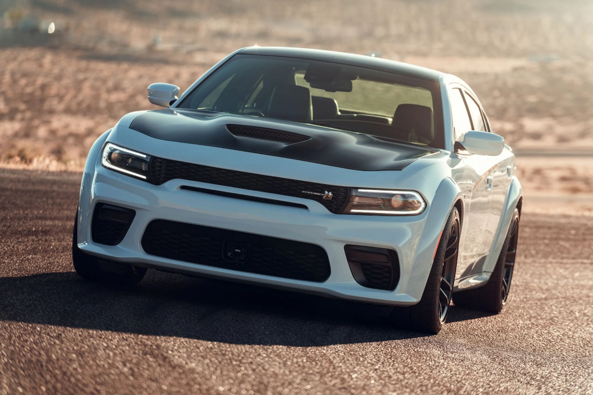 the 2021 dodge charger scat pack widebody is powered by the 392 cubic inch hemi&reg; v 8 engine with the best in class naturally aspirated 485 horsepower mated to the torqueflite 8hp70 eight speed transmission