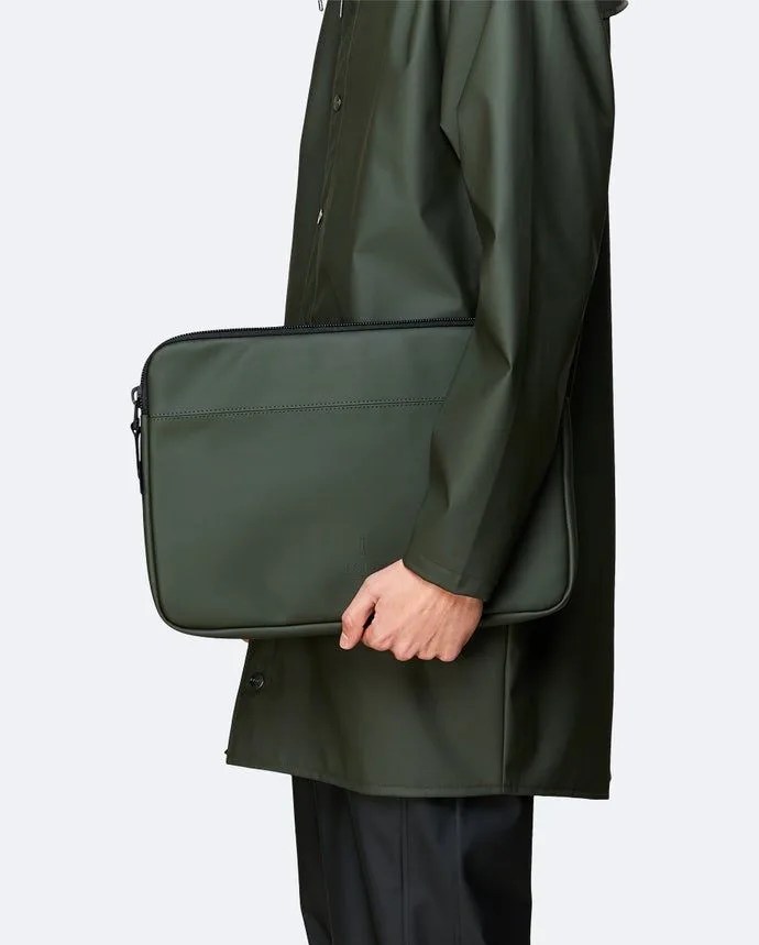 man holding rains laptop cover