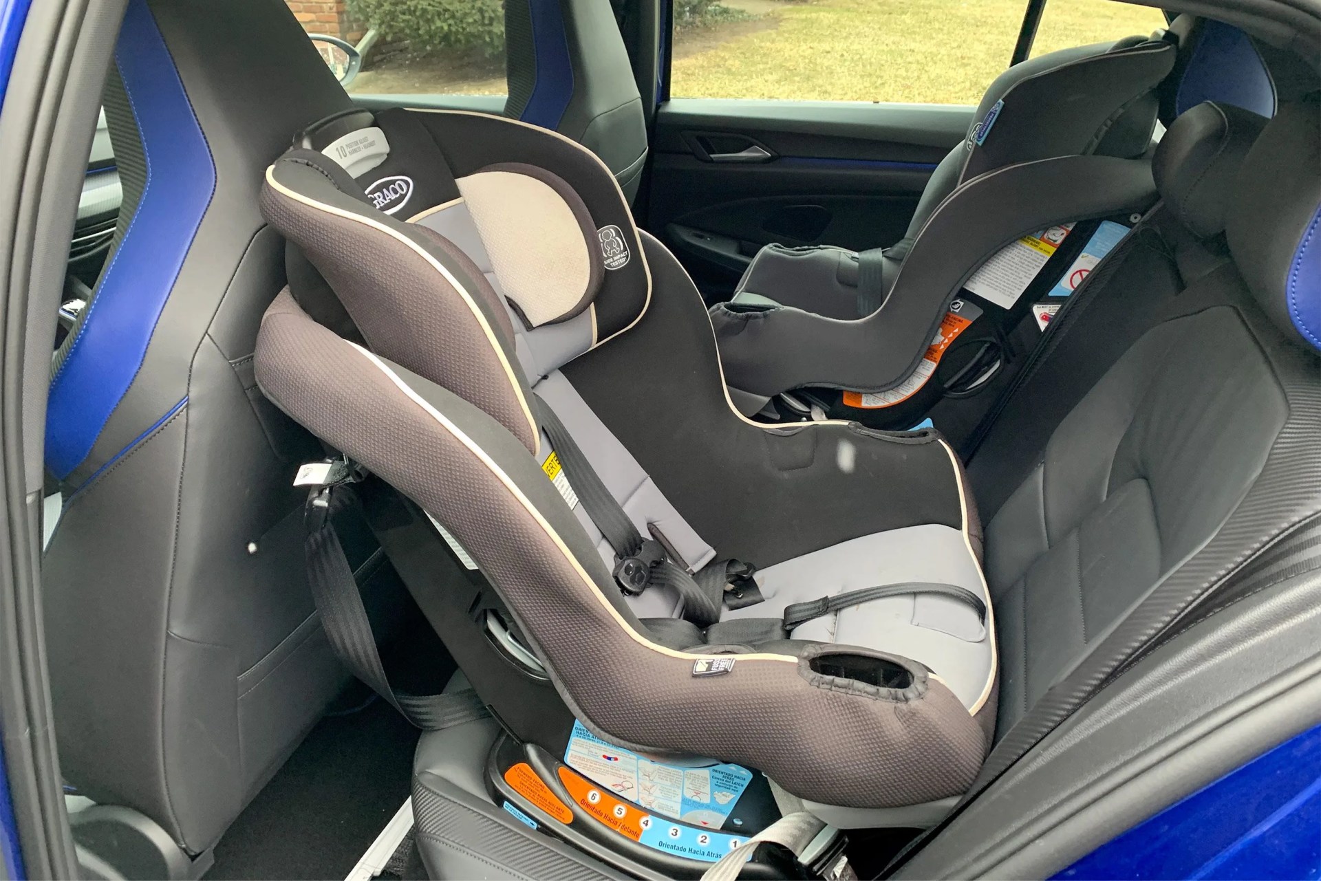 2022 volkswagen golf r backseat with child seat
