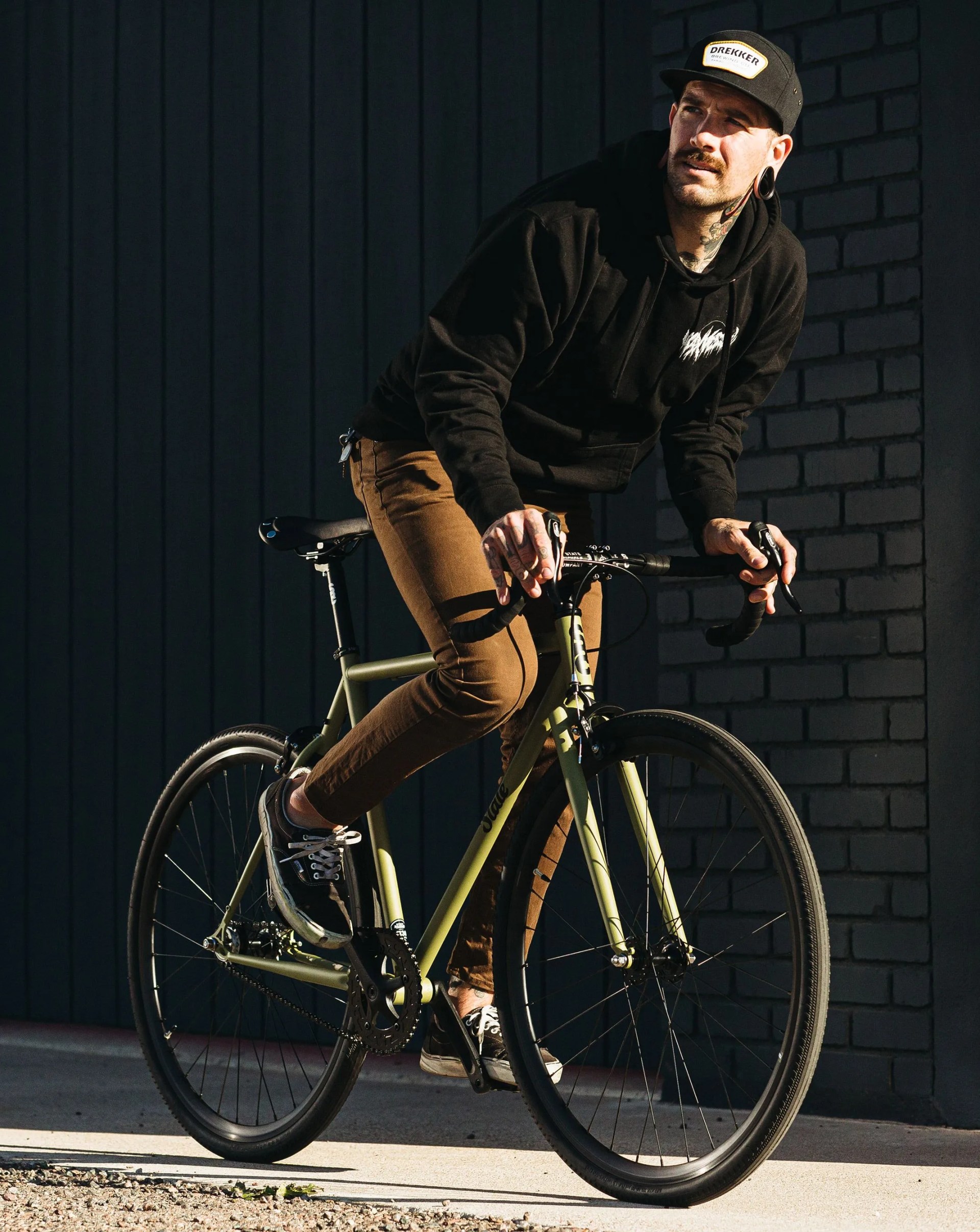 man riding around on state bicycle