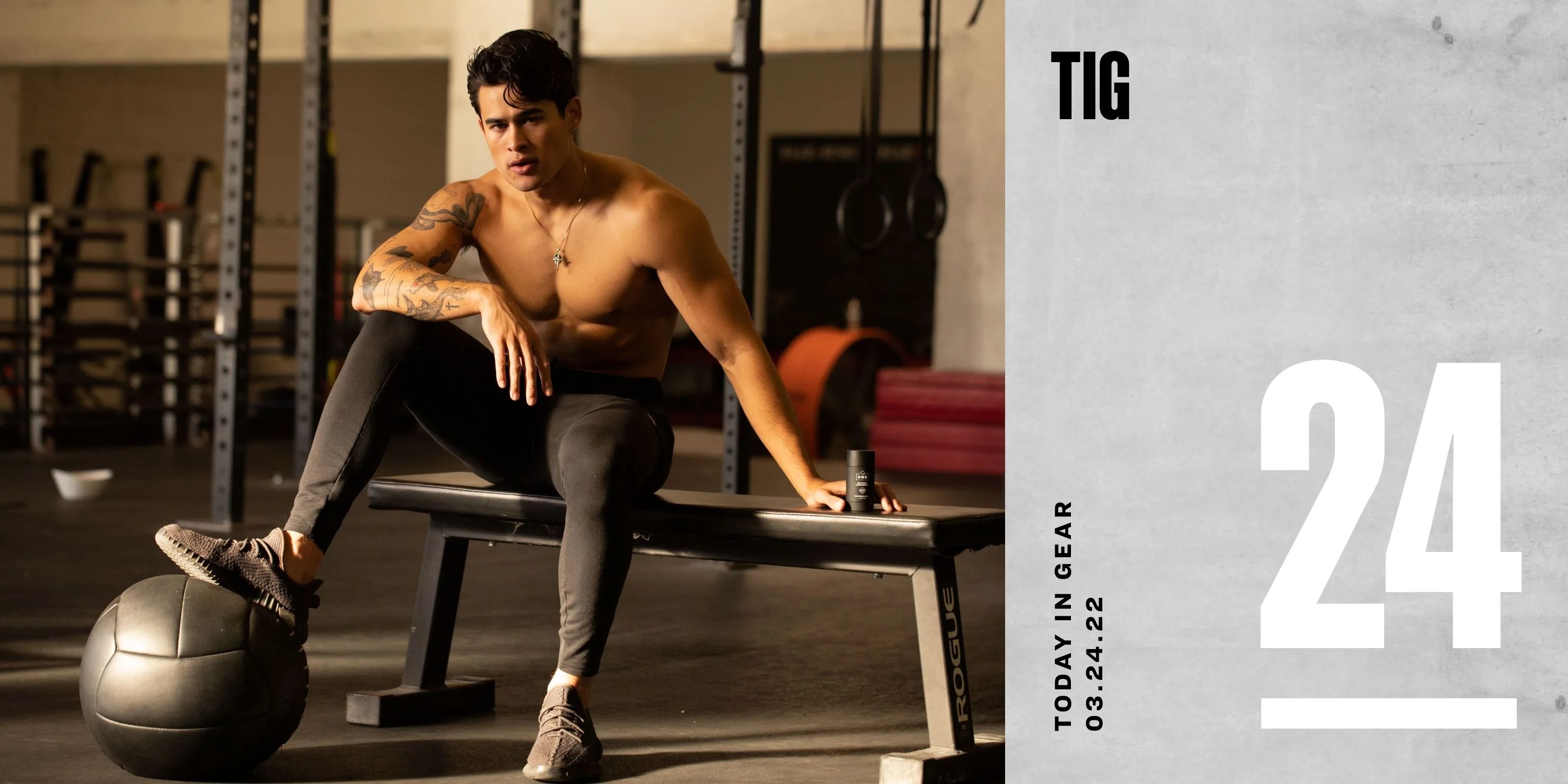 today in gear march 24 2022 shirtless man sitting on workout bench with one foot on a black volleyball holding hardworking gentleman deodorant