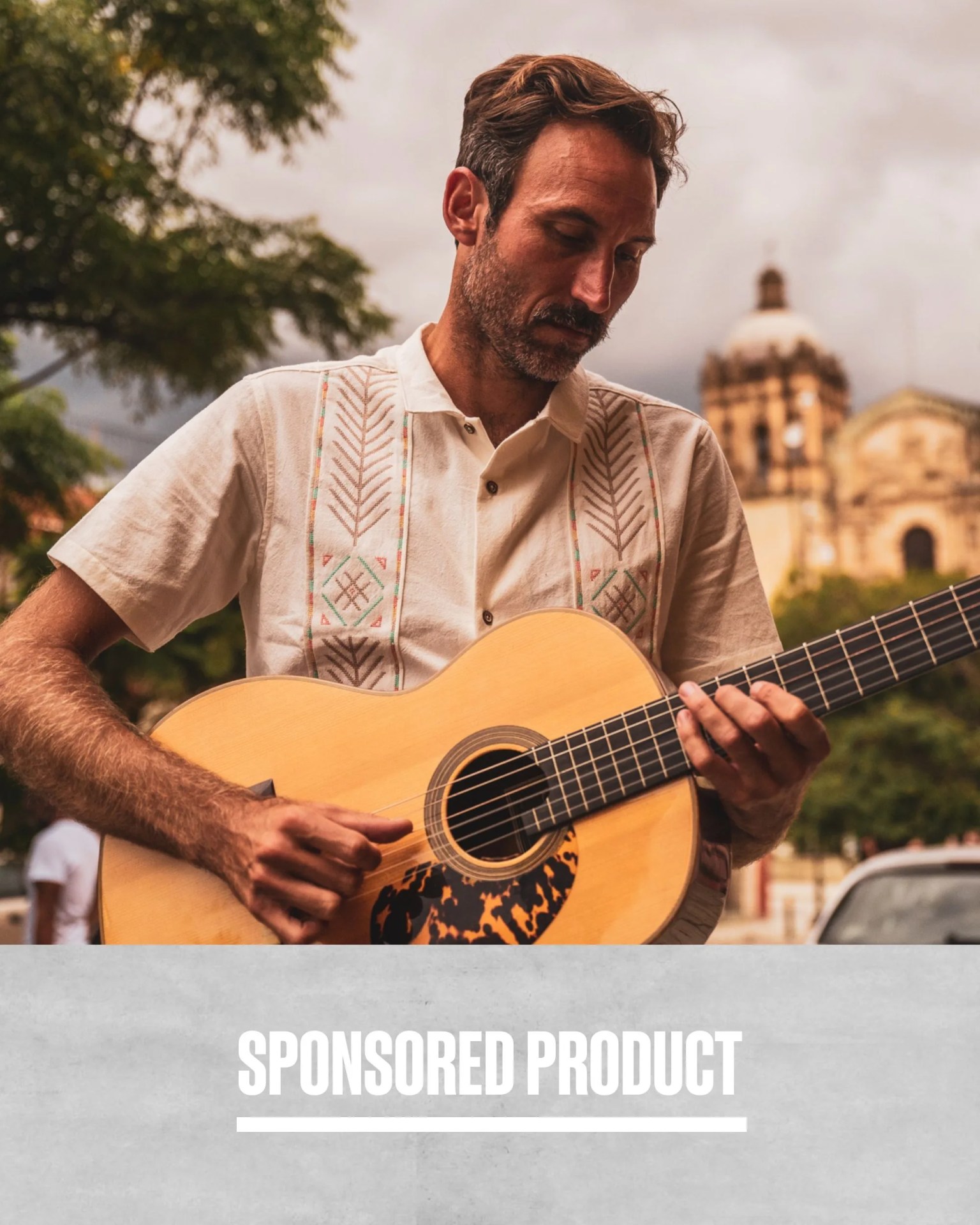 sponsored product man playing guitar wearing roark la boda gonzo button up shirt