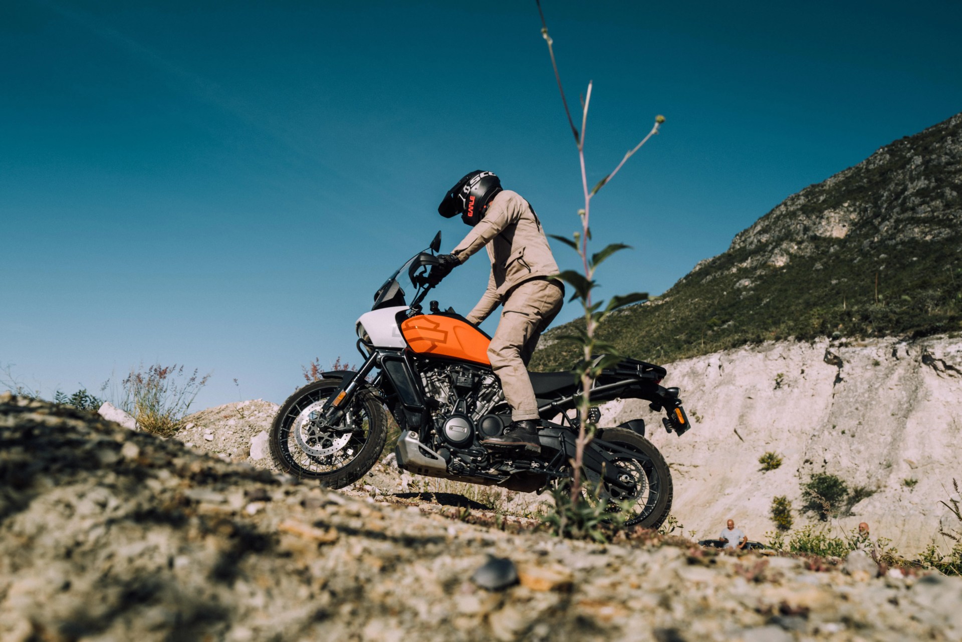 man riding aether motorcycle