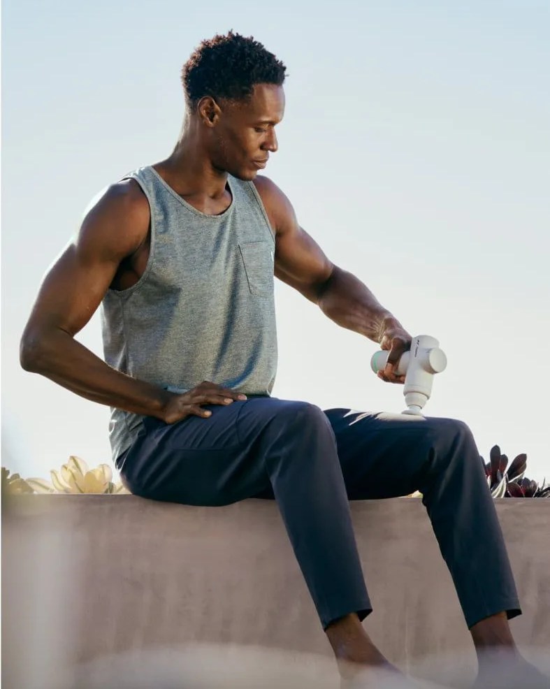 man using hyperice hypervolt go 2