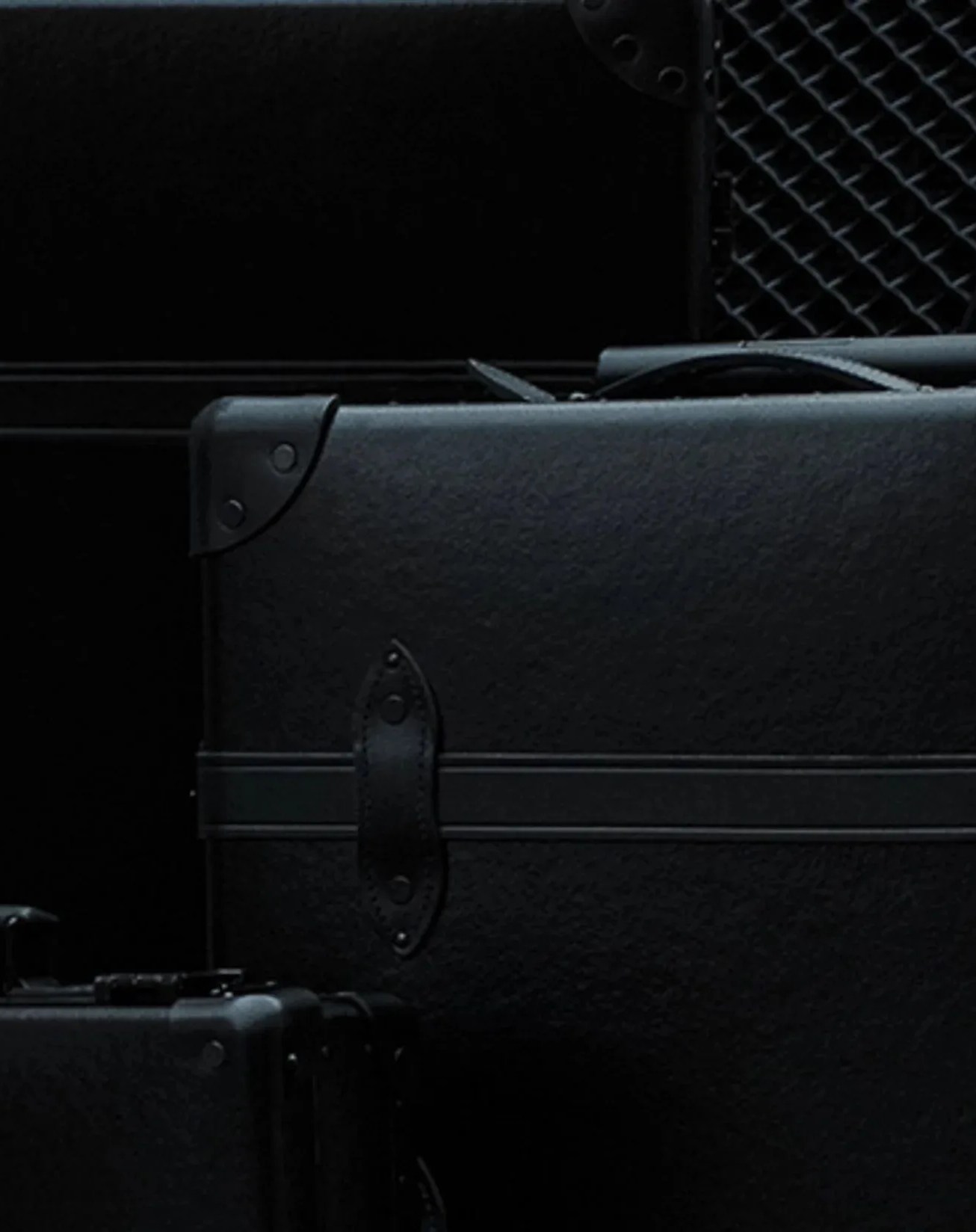 globe trotter blacked out luggage collection