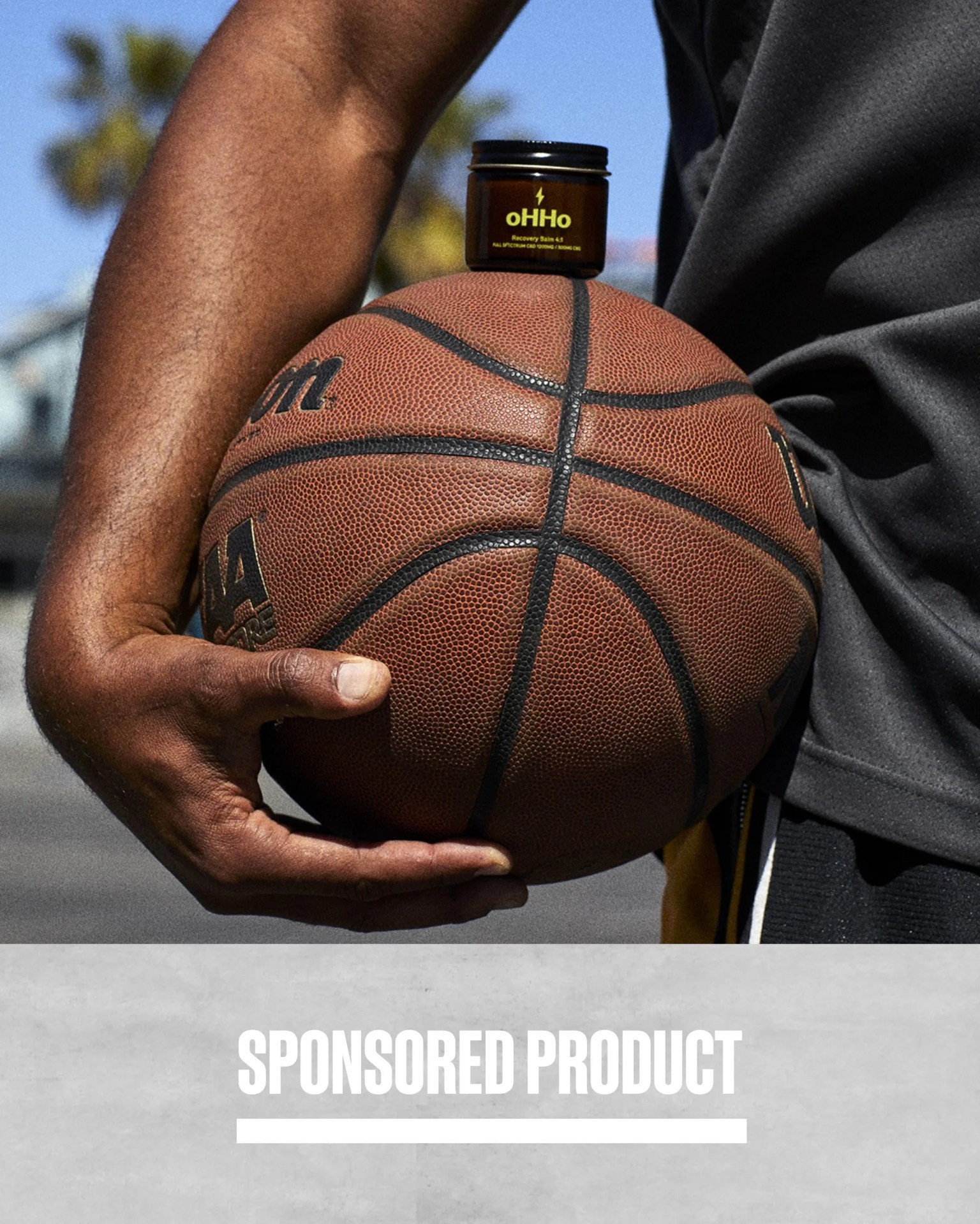 ohho recovery balm balanced on basketball