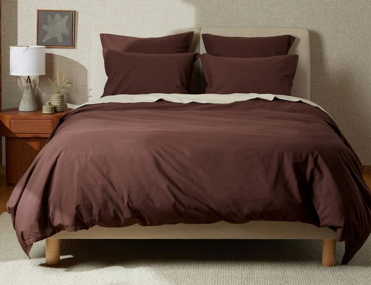 brown duvet cover on bed