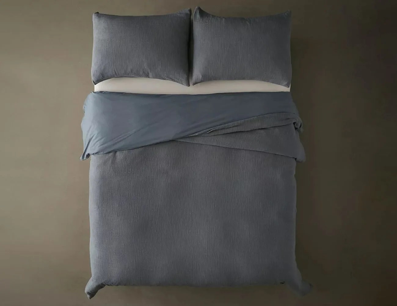 duvet cover from urban outfitters on a bed