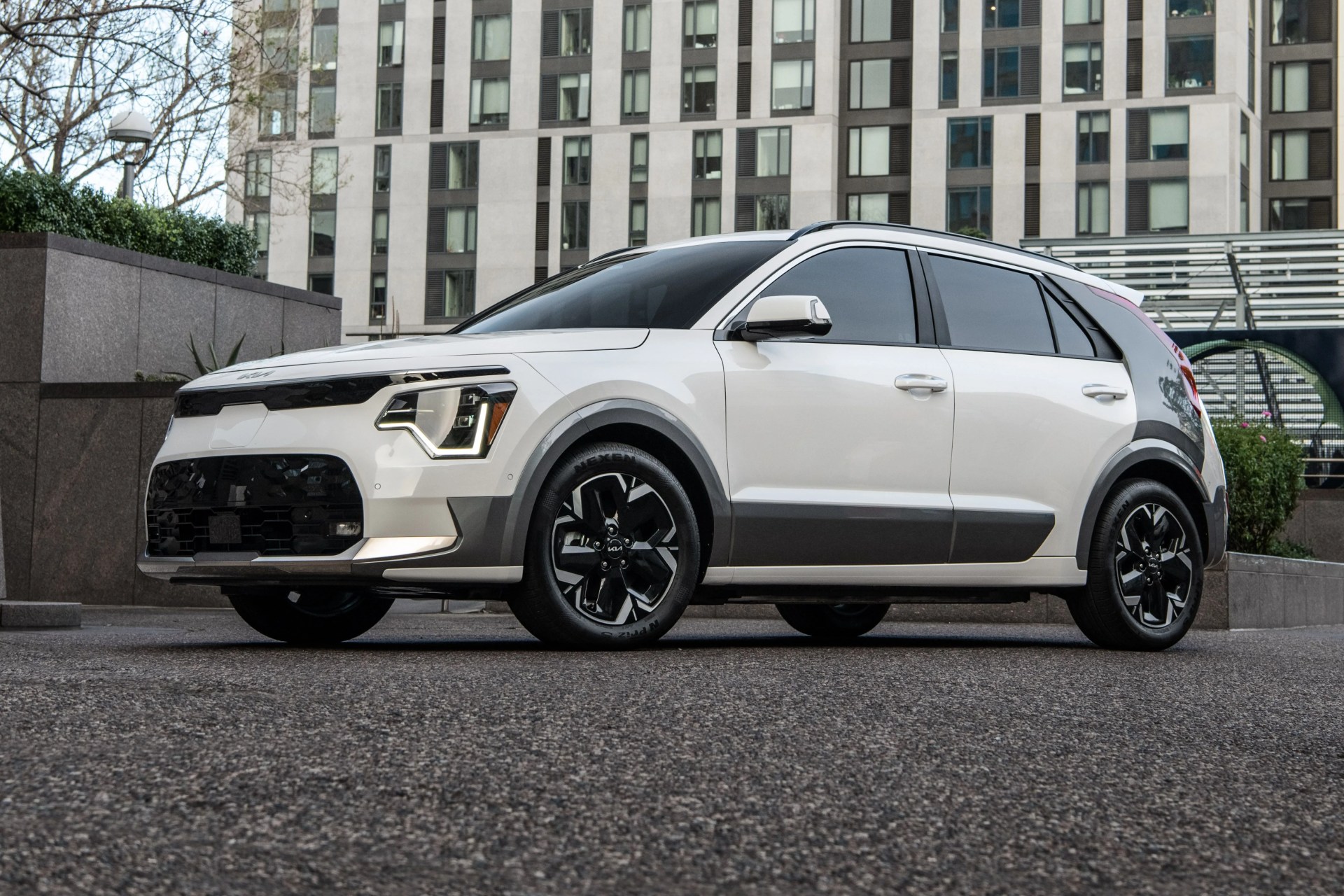 kia niro ev parked in front of a building