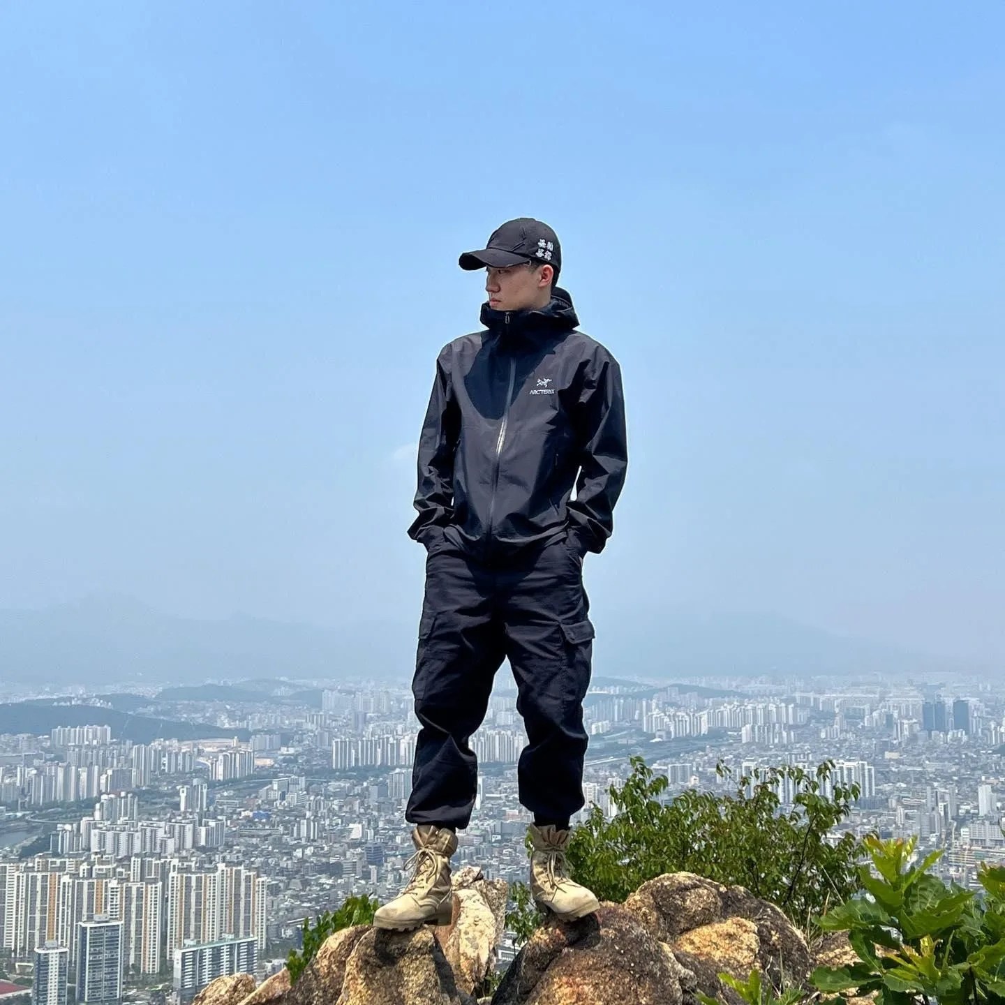 man wearing arcteryx beta jacket