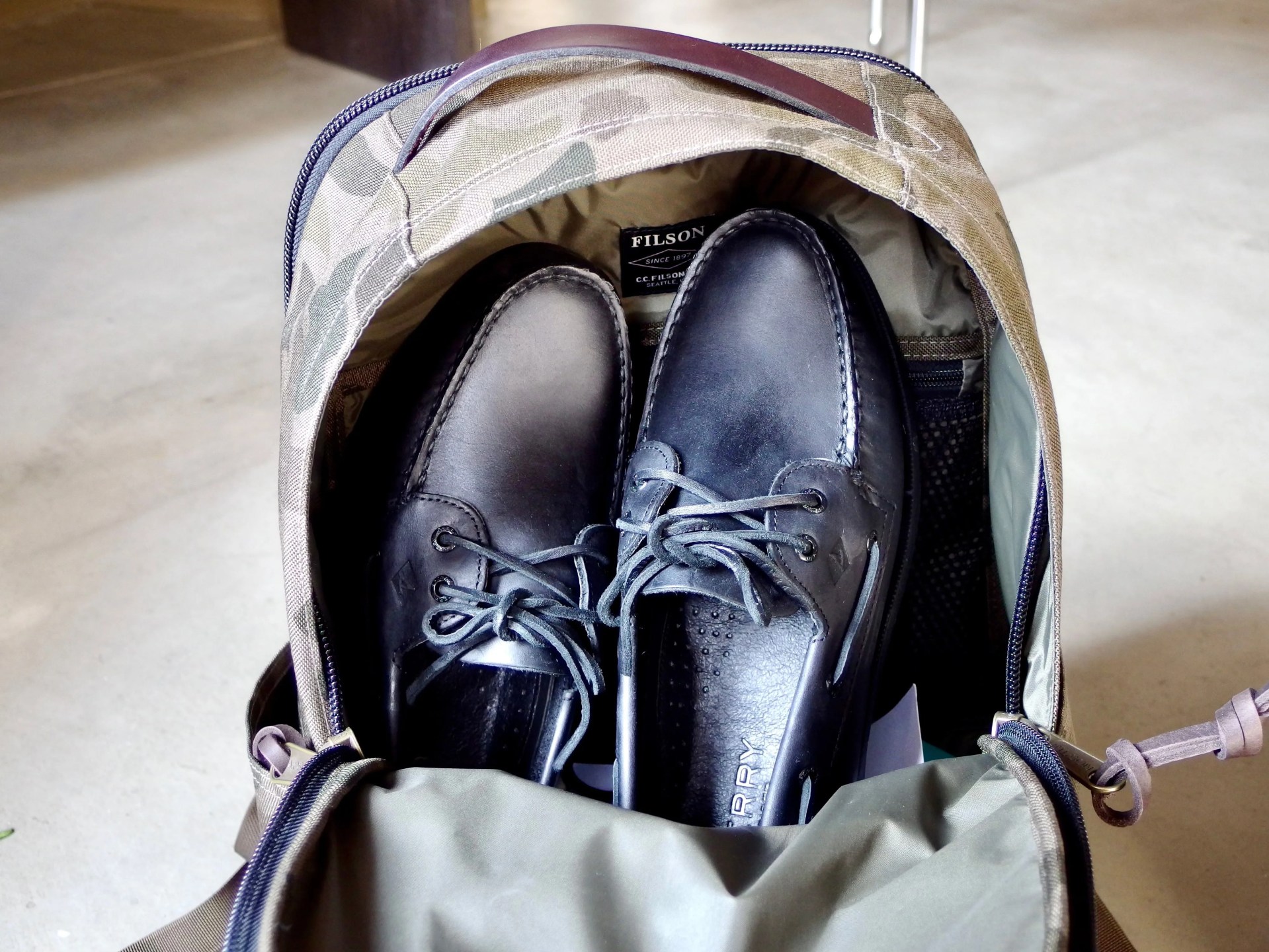 filson dryden backpack with shoes inside
