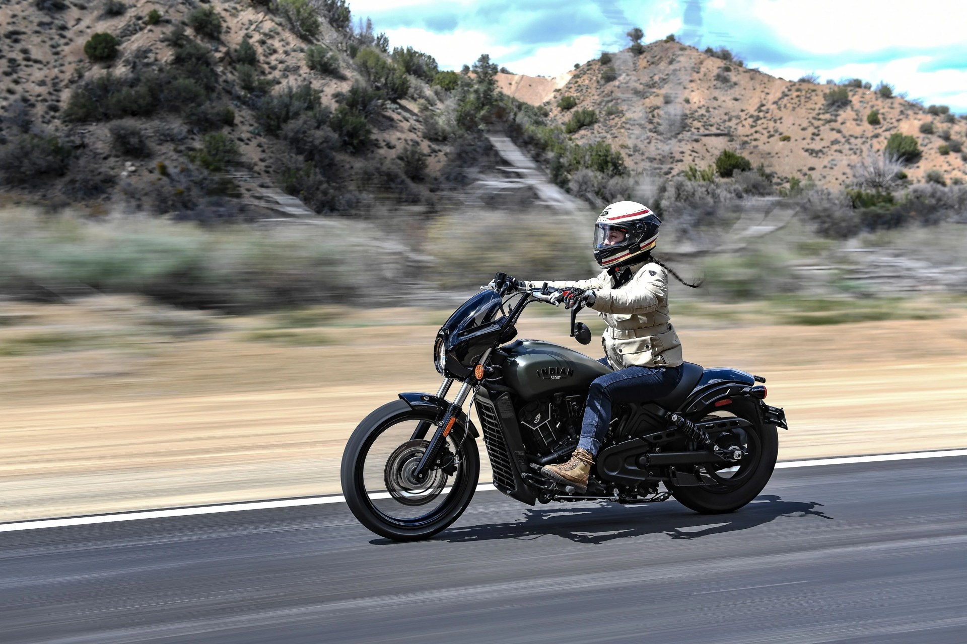 woman riding the 2022 indian scout rogue motorcycle