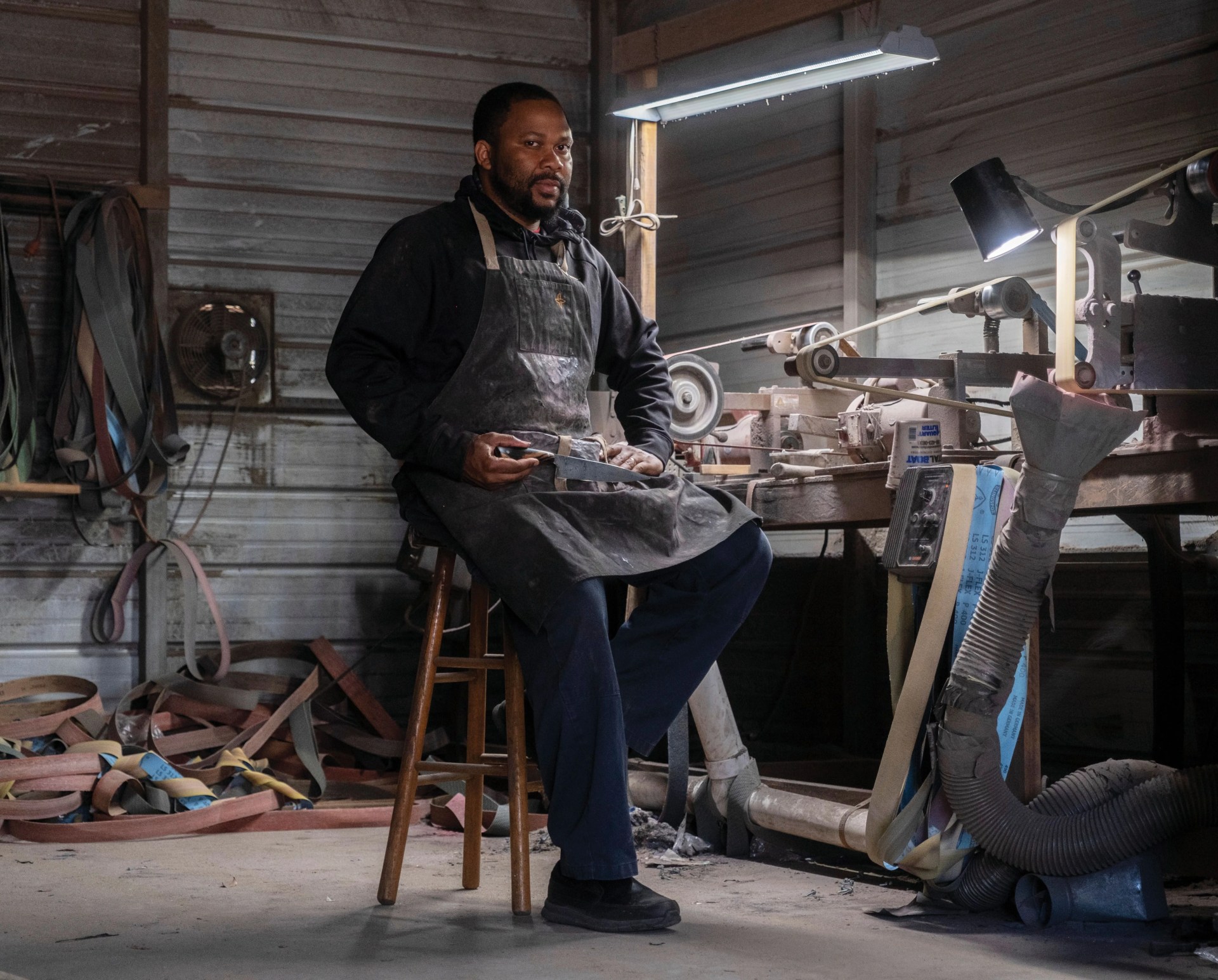 quintin middleton sits in his workspace behind his home in saint stephen, south carolina