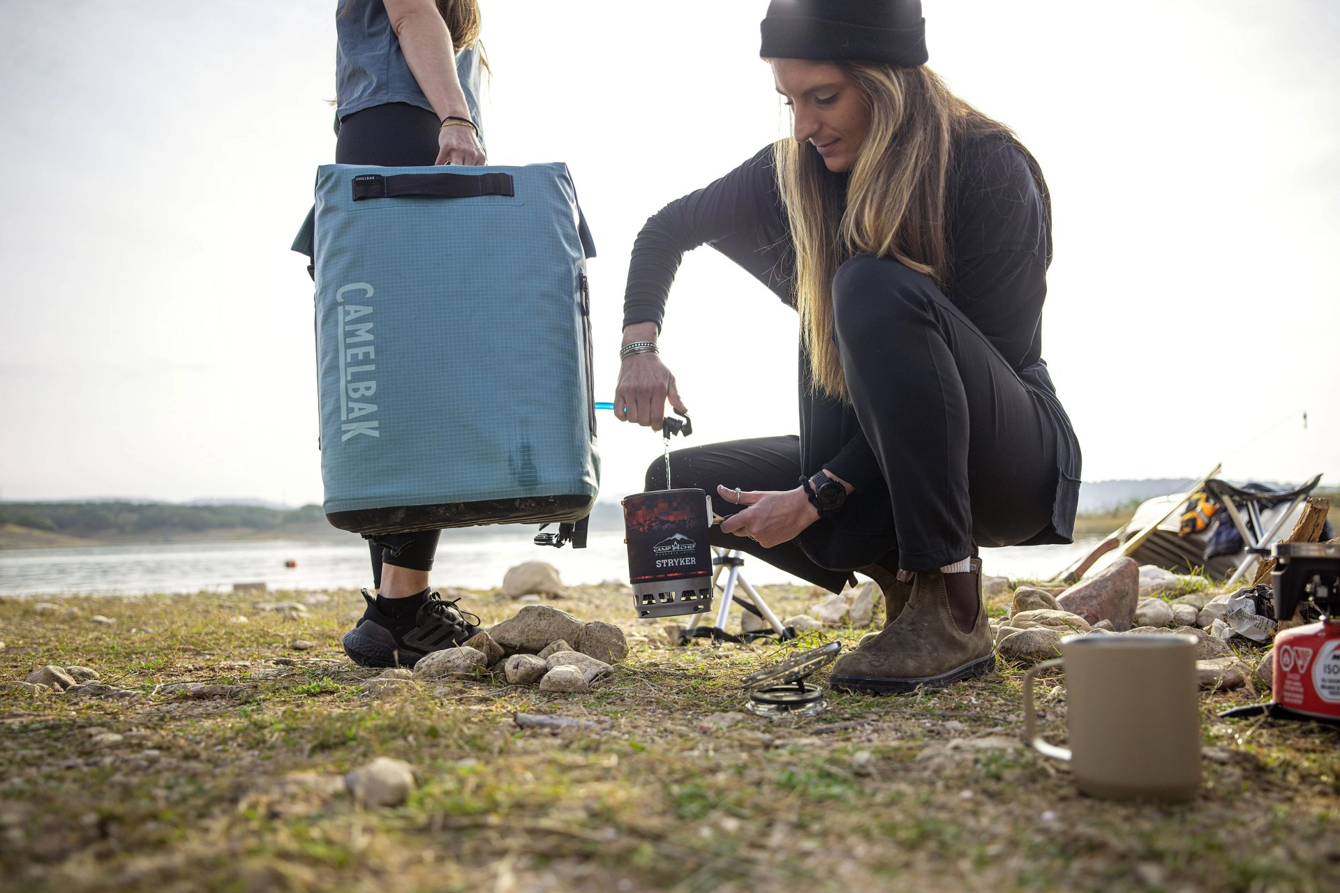 woman using spiget from camelbak chillbak pack 30