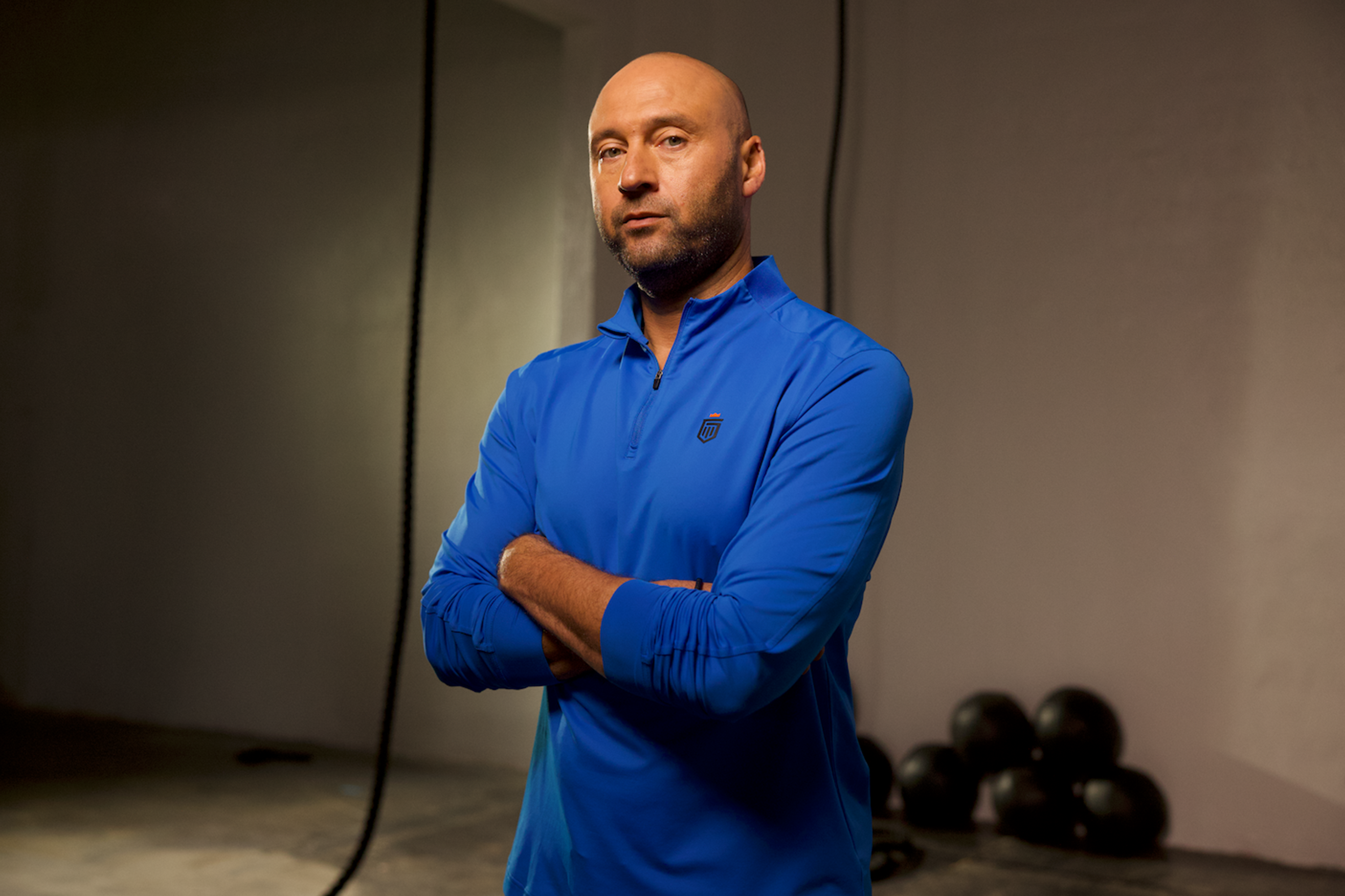 derek jeter posing with arms crossed