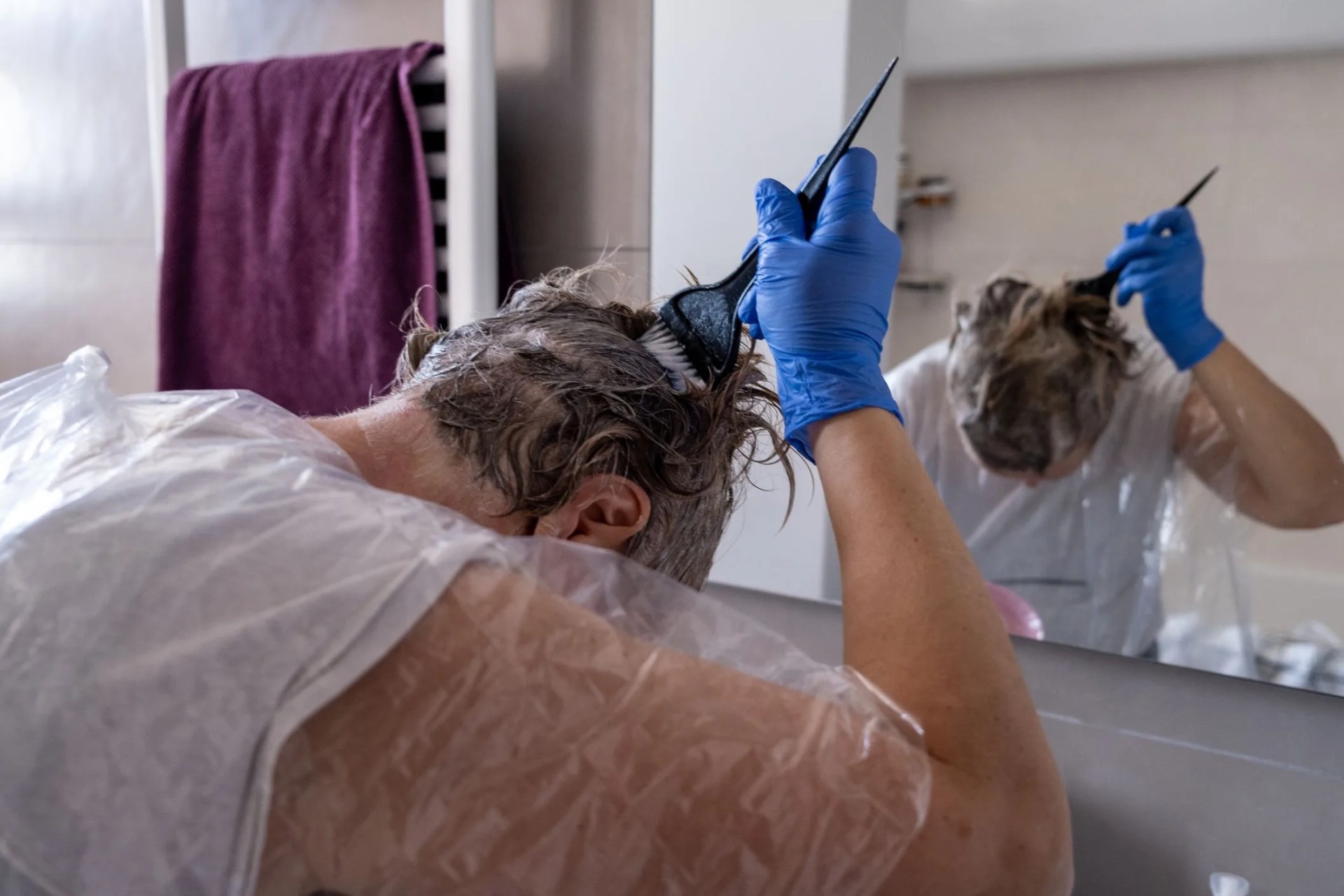 someone dyeing hair at home