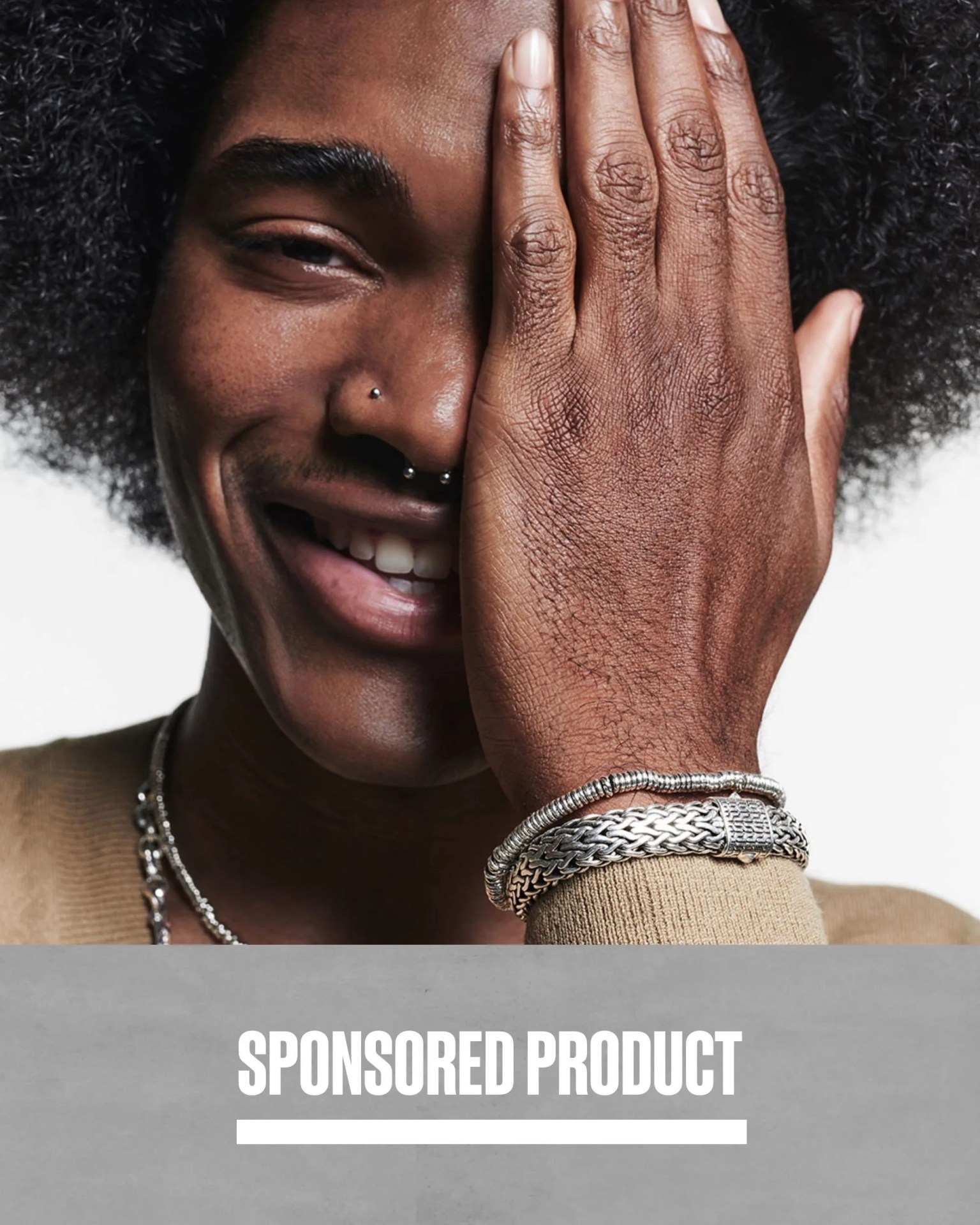 sponsored product man wearing john hardy's heishi beaded bracelet