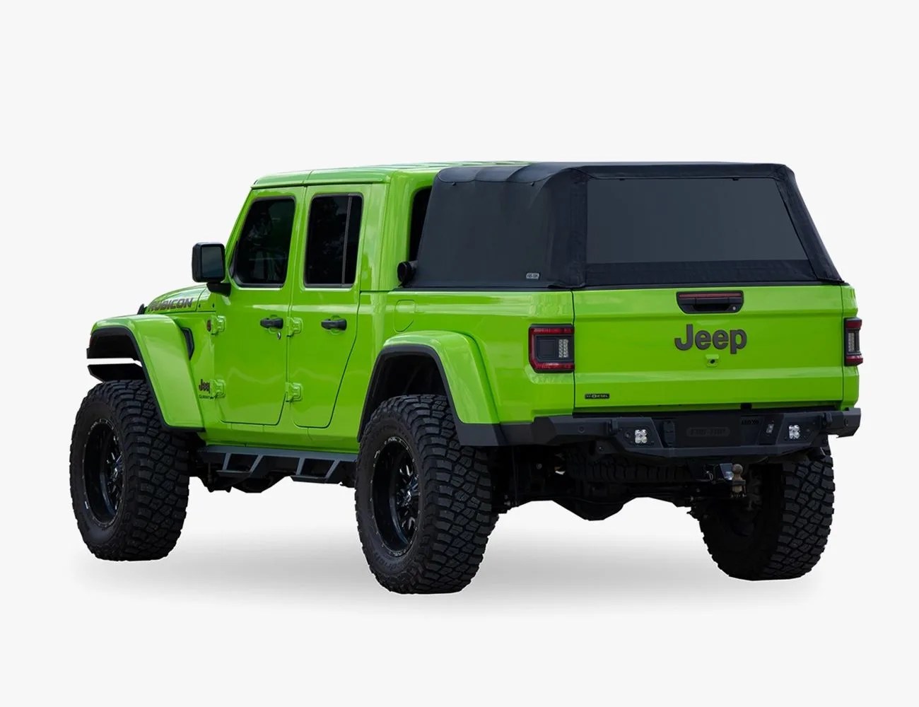 green jeep with a Fas-Top Traveler Topper