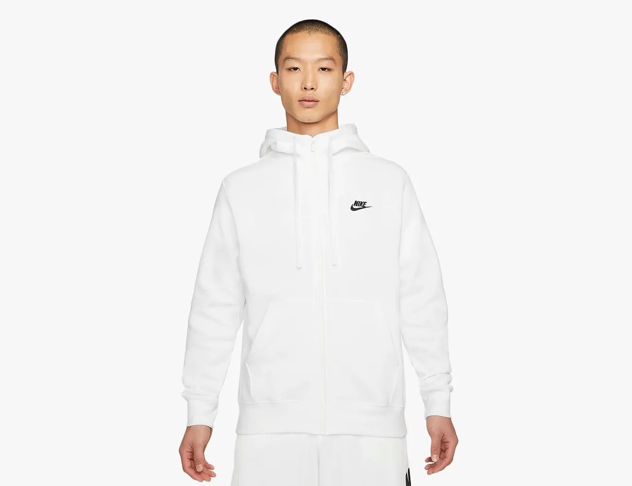 man wearing a white Nike Sportswear Club Fleece Full-Zip Hoodie