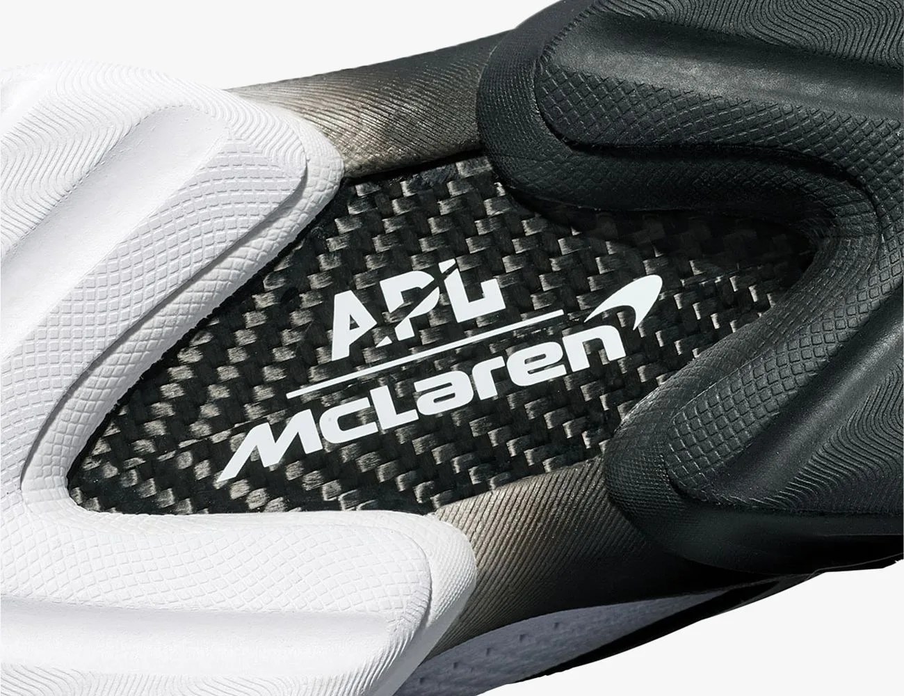 APL, McLaren Team Up to Create a Supercar-Inspired Running Shoe