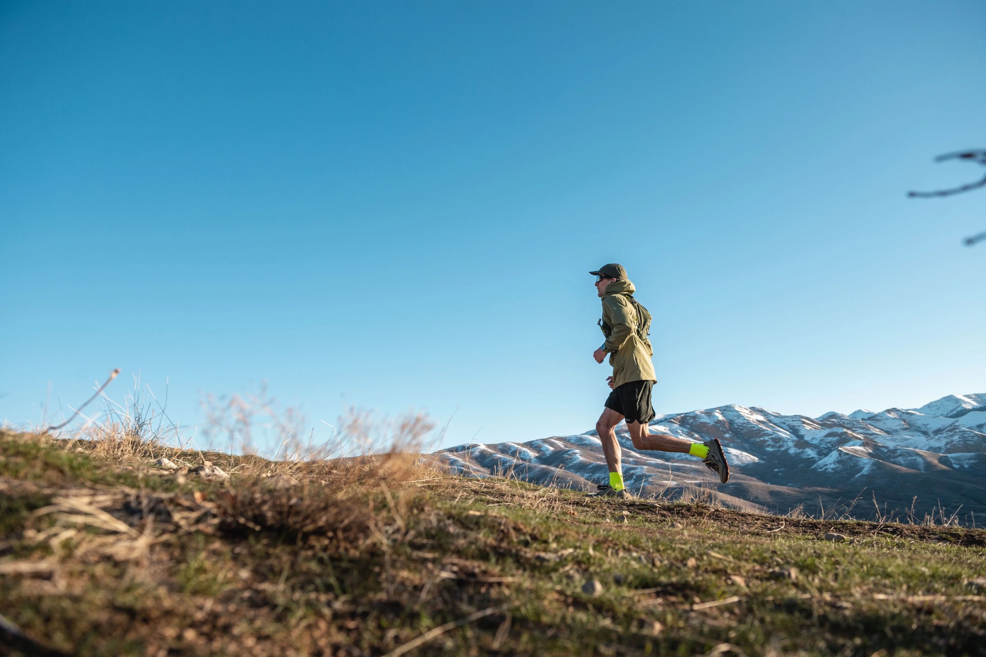 man running on hillside