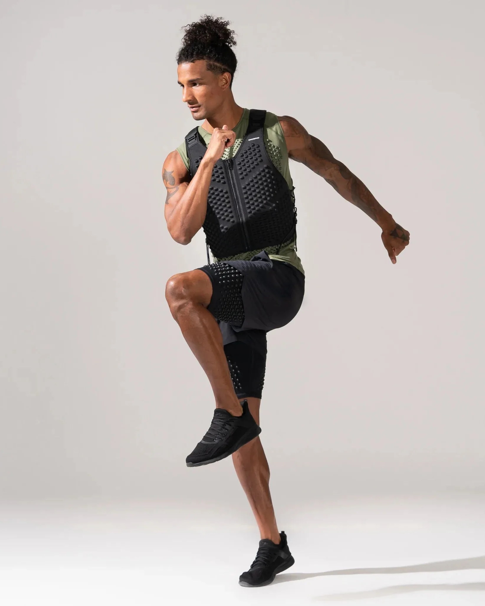 man wearing omorpho g vest