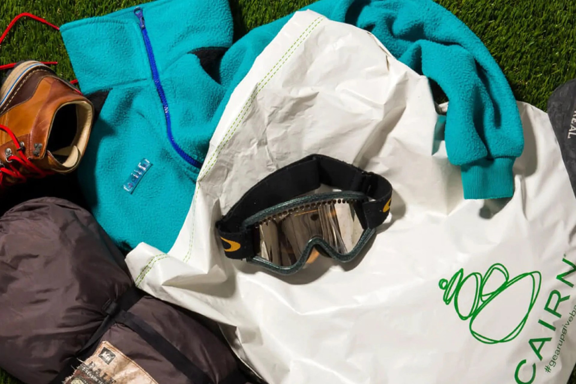 outdoor gear in a pile for donations