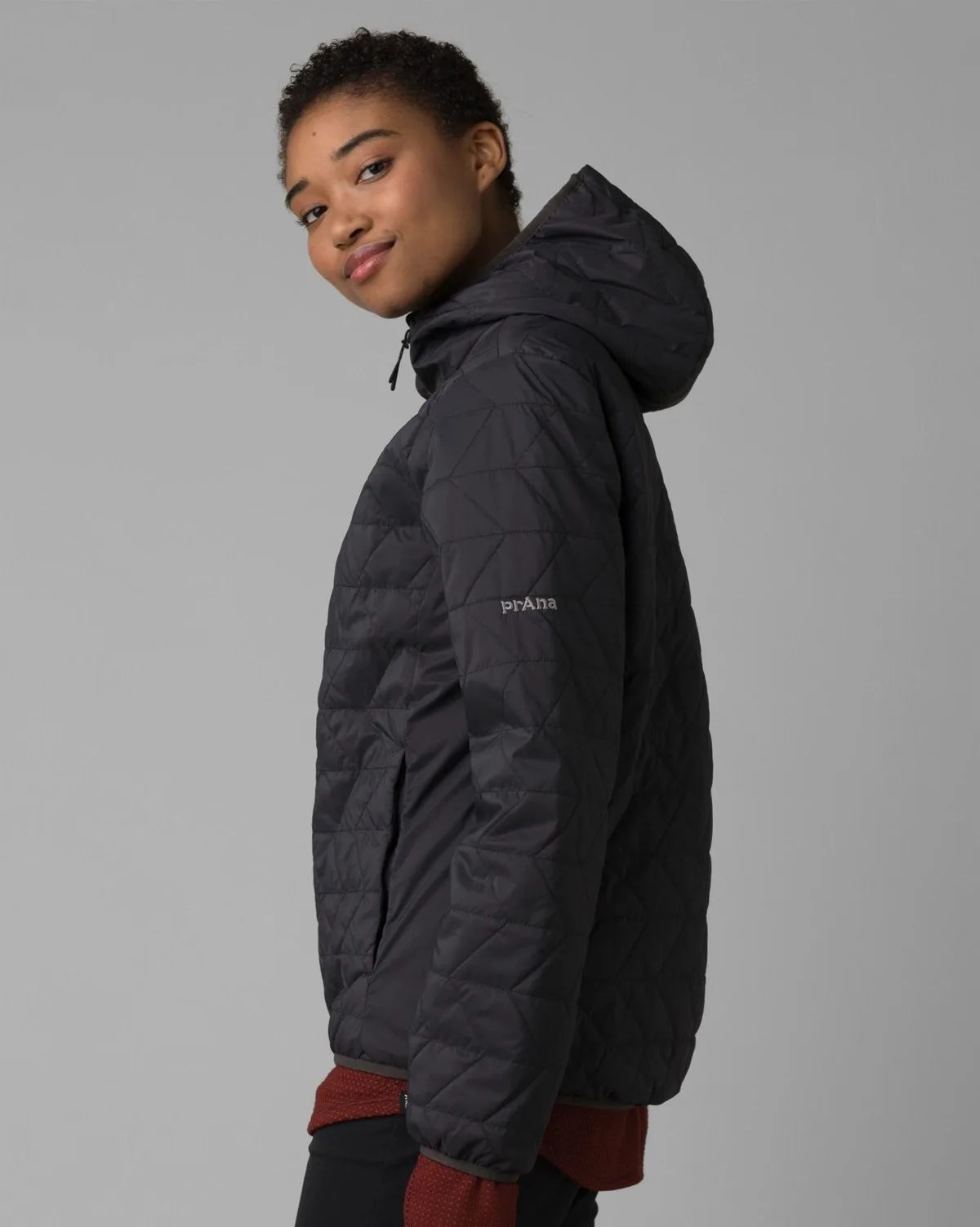 woman wearing prana alpine air hooded jacket