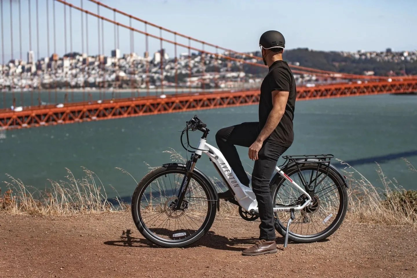 man riding an aventon level 2 ebike overlooking the golden gate bridge