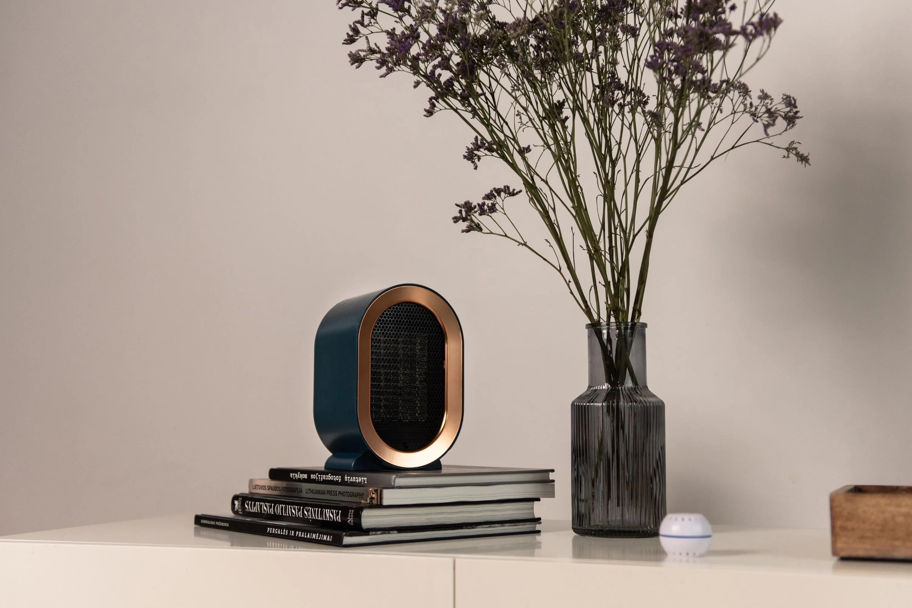 fara smart and cost effective heater sitting on top of books