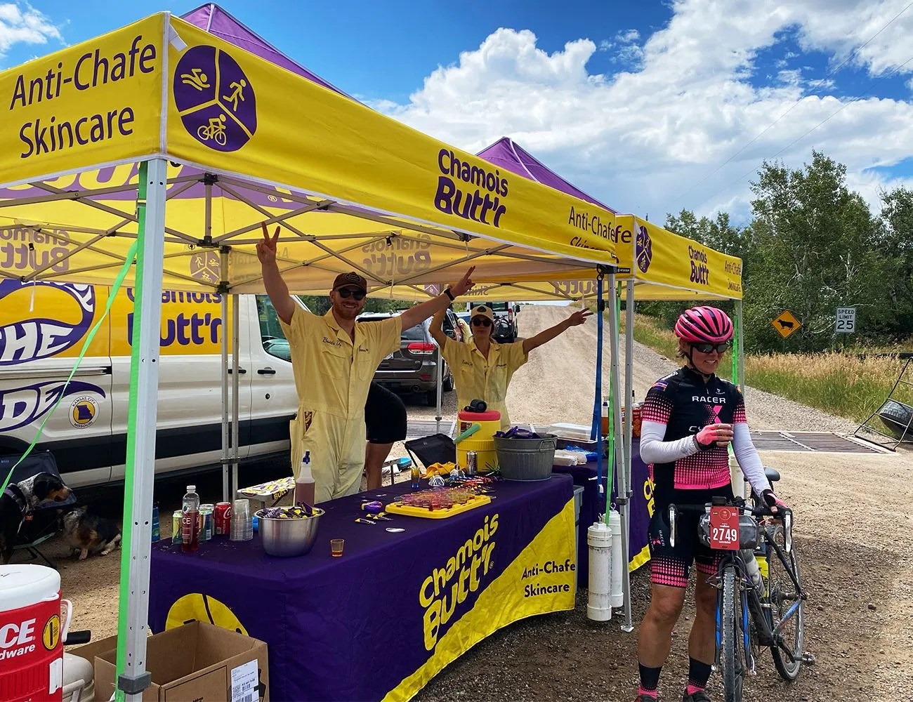 gravel bike race athlete and aid station