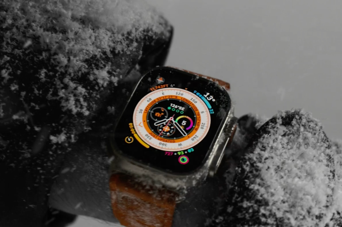 apple watch ultra on wrist with snow
