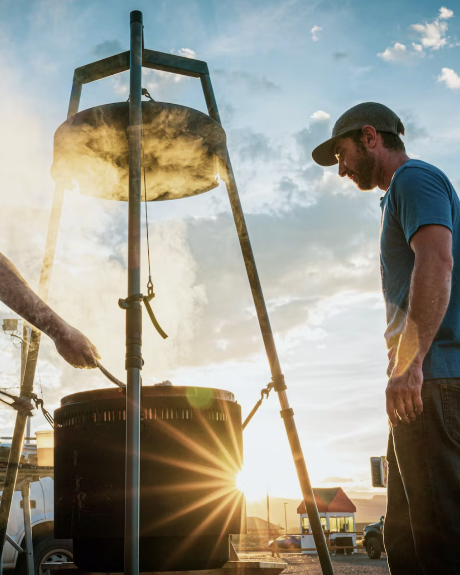 a man in a blue shirt using the burch barrel v2 grill