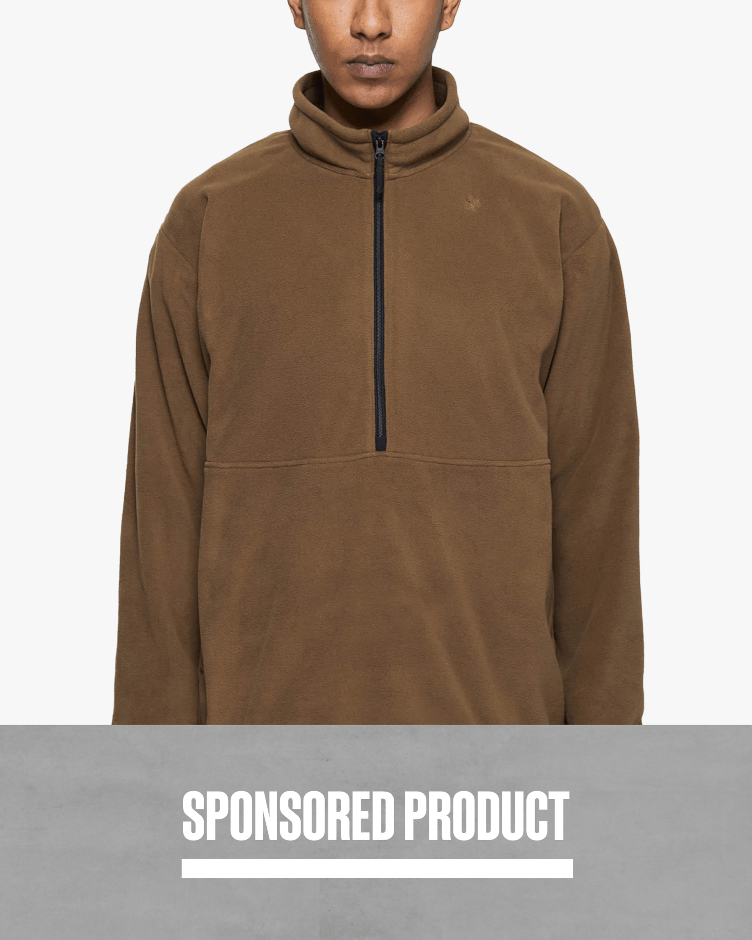a man wearing a brown goldwin micro fleece half zip
