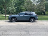 honda hr v parked next to a park