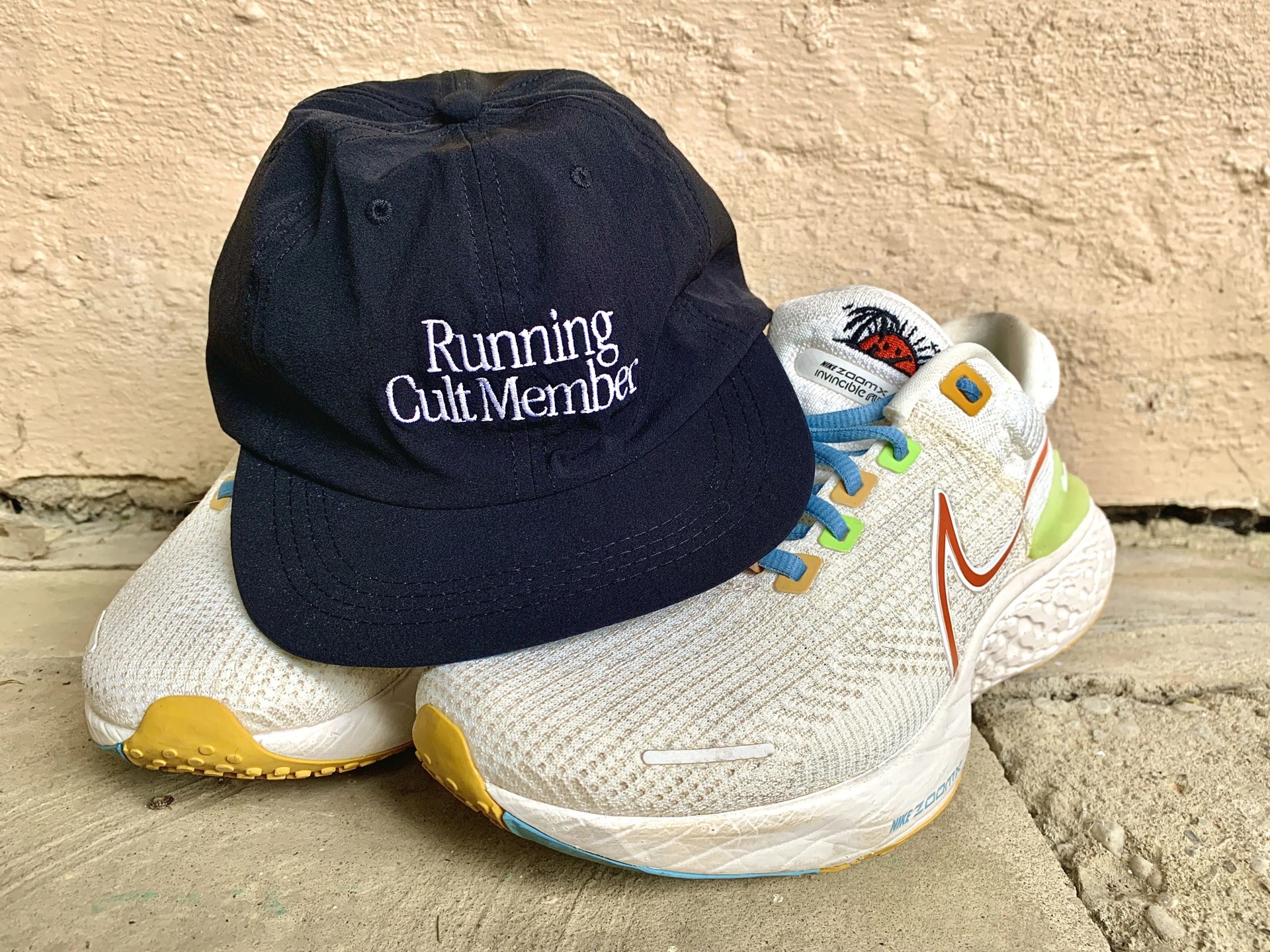 satisfy peaceshell running cap