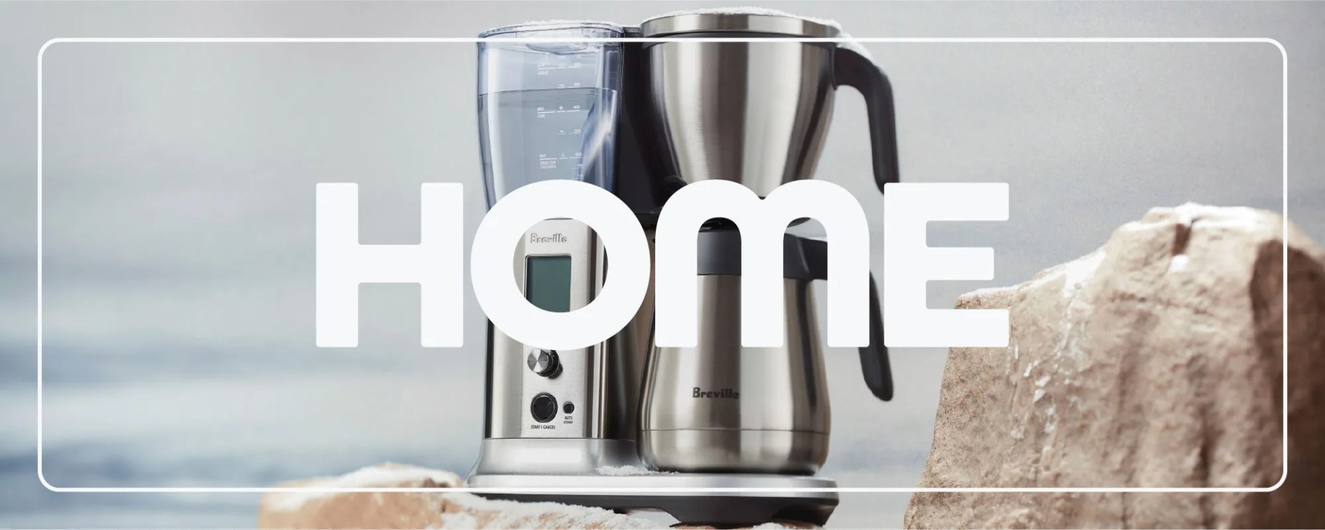 breville coffee maker on snowy rocks