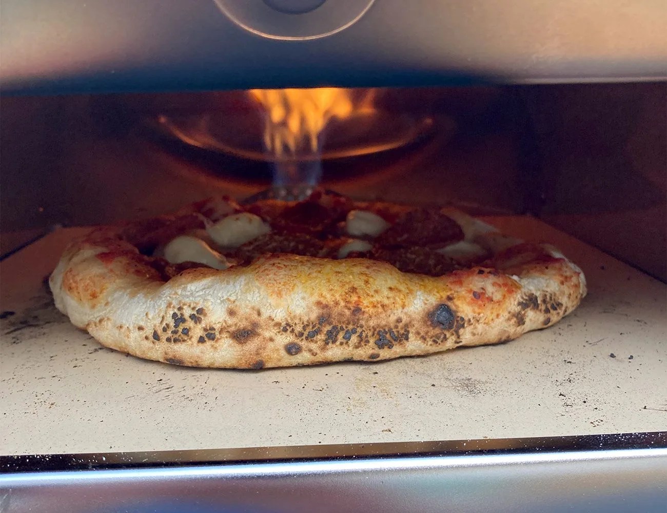 pizza baking in gozney roccbox oven