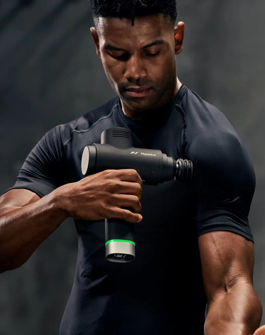 man using hypervolt 2 pro