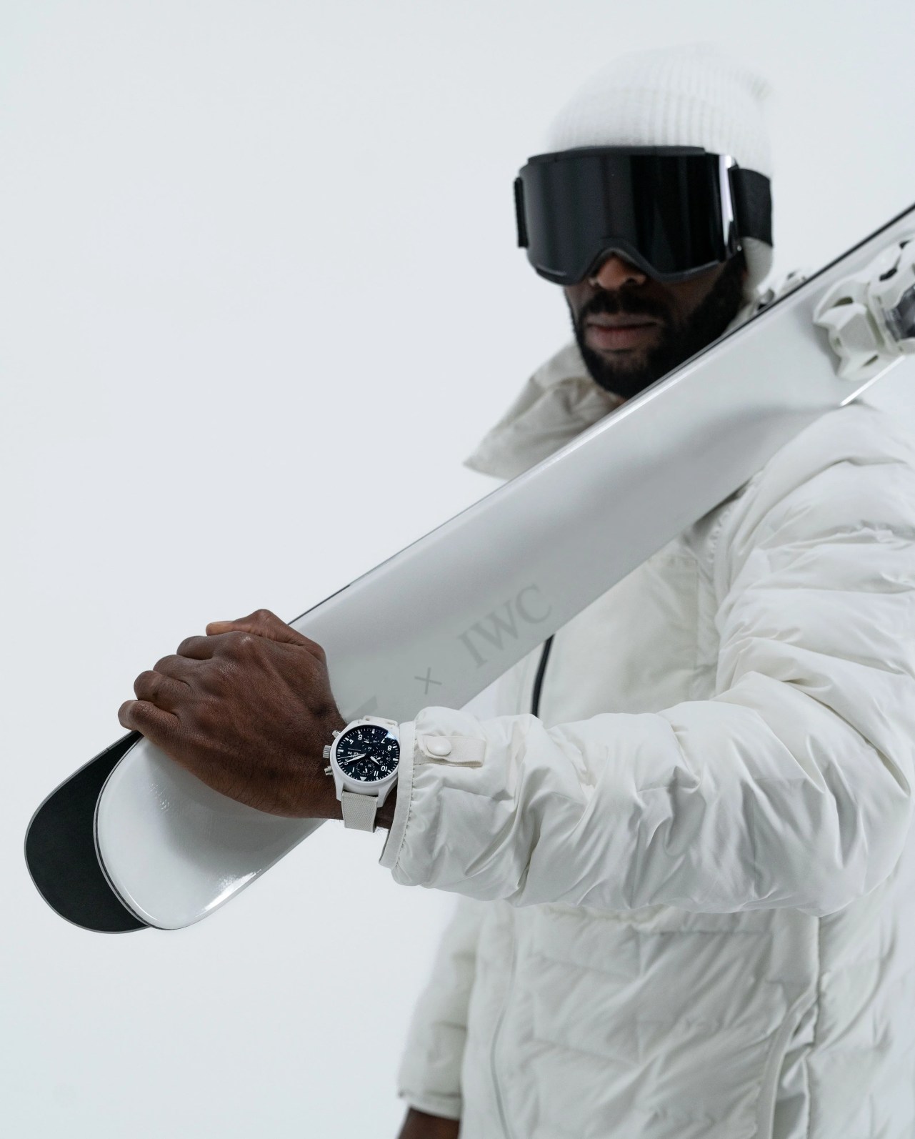 man holding studio 1 iwc collab with iwc free skiers