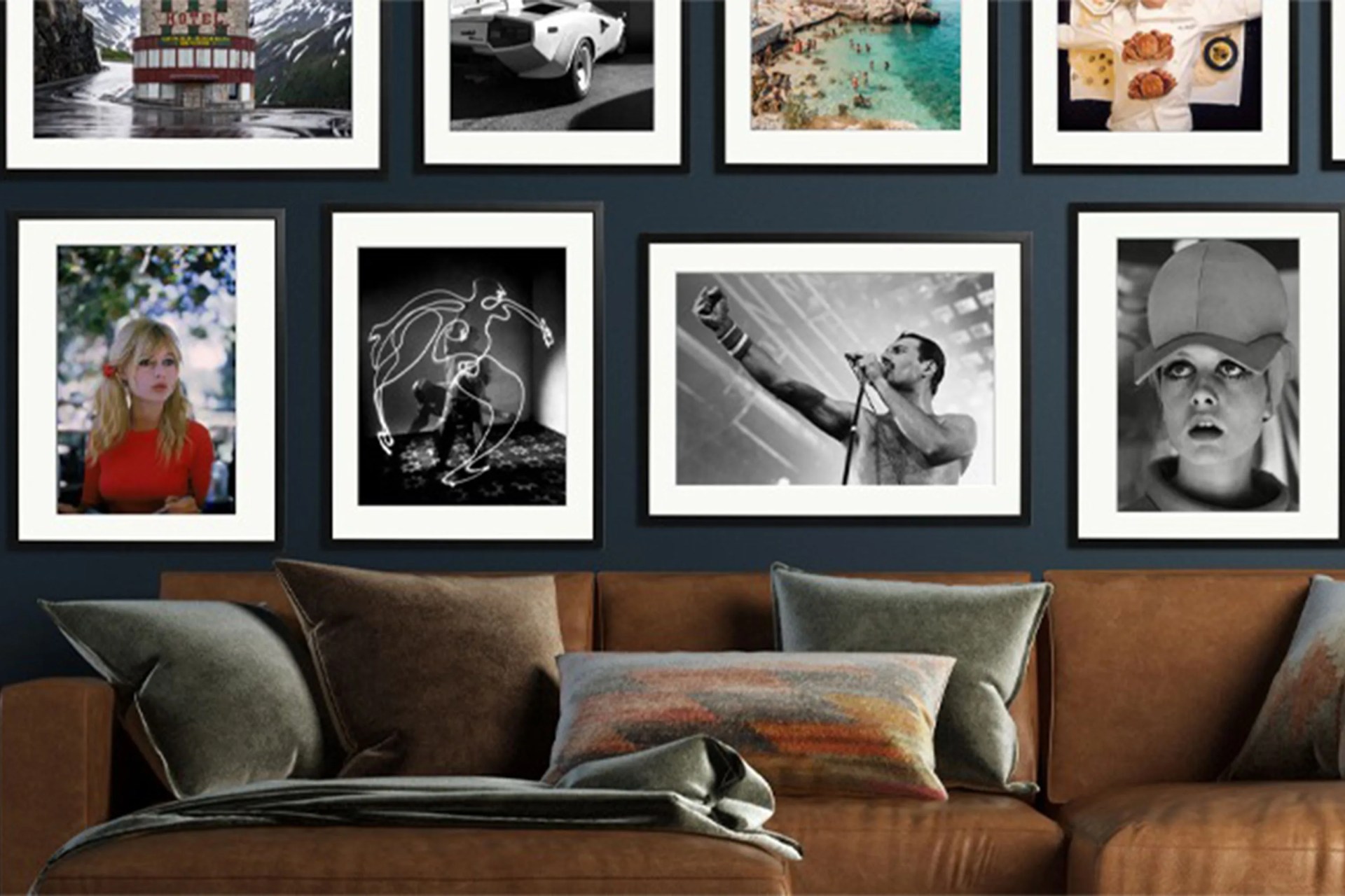framed images above a couch