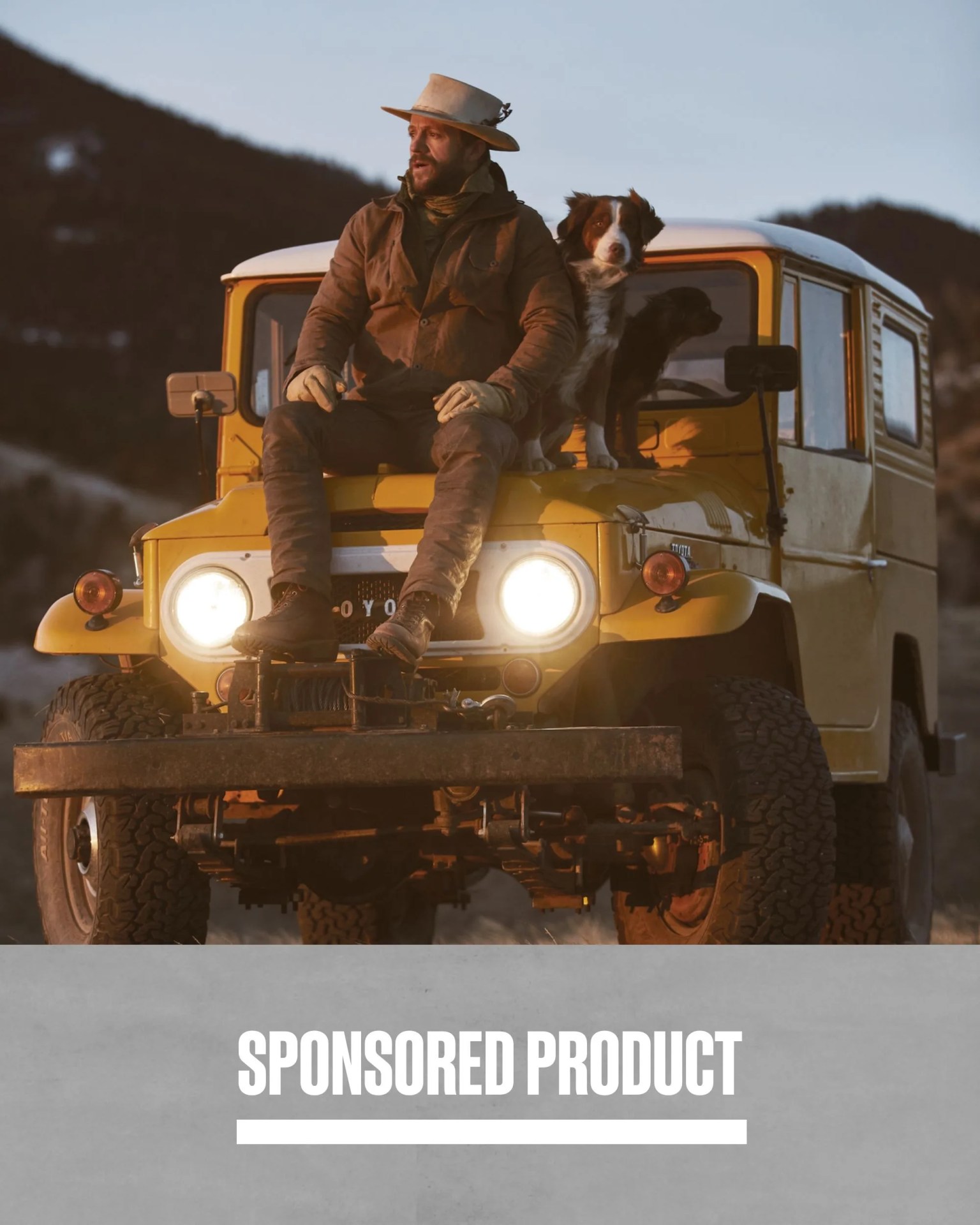 sponsored product huckberry man sitting on car next to dog