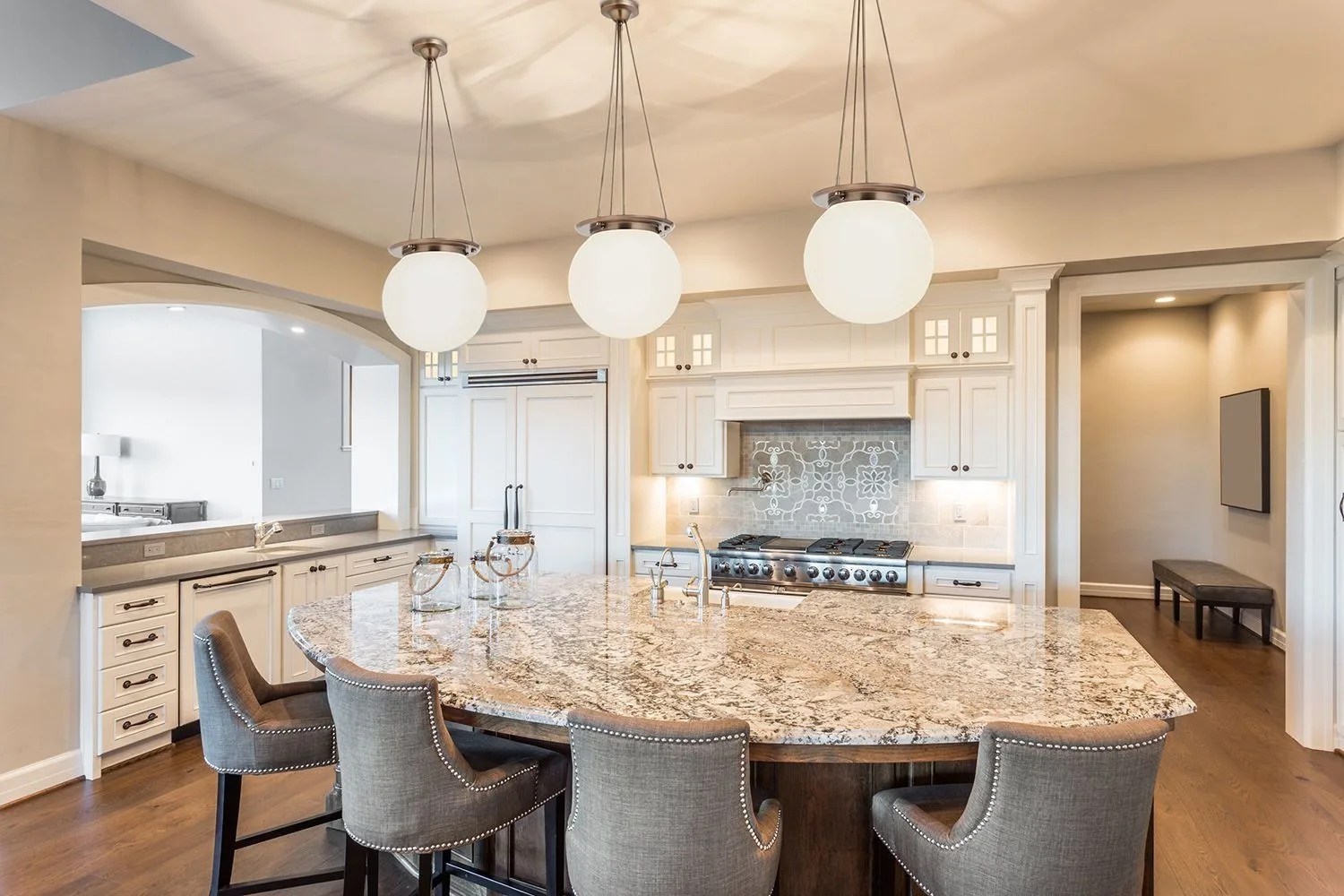 fabric chairs at a kitchen island
